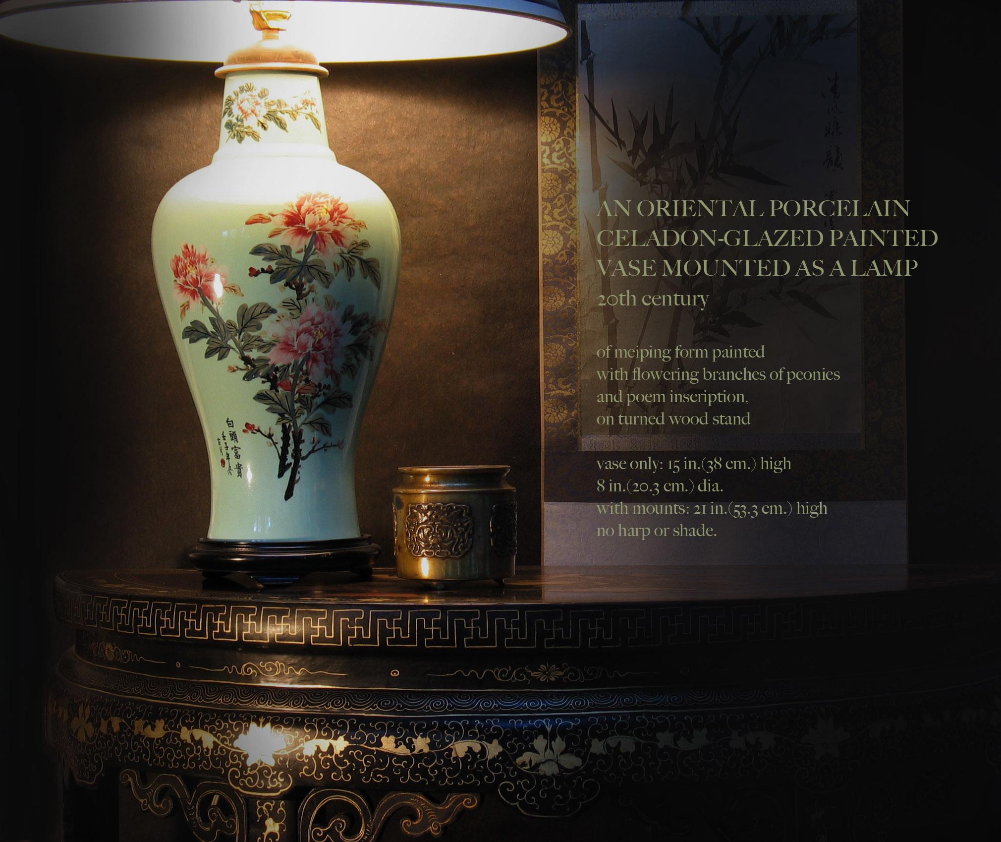 An oriental porcelain
Celadon-Glazed painted
Vase mounted as a lamp
20th century.

Of meiping form painted
with flowering branches of peonies
and poem inscription,
on turned wood stand.

Measures: vase only: 15 in.(38 cm.) high.
8