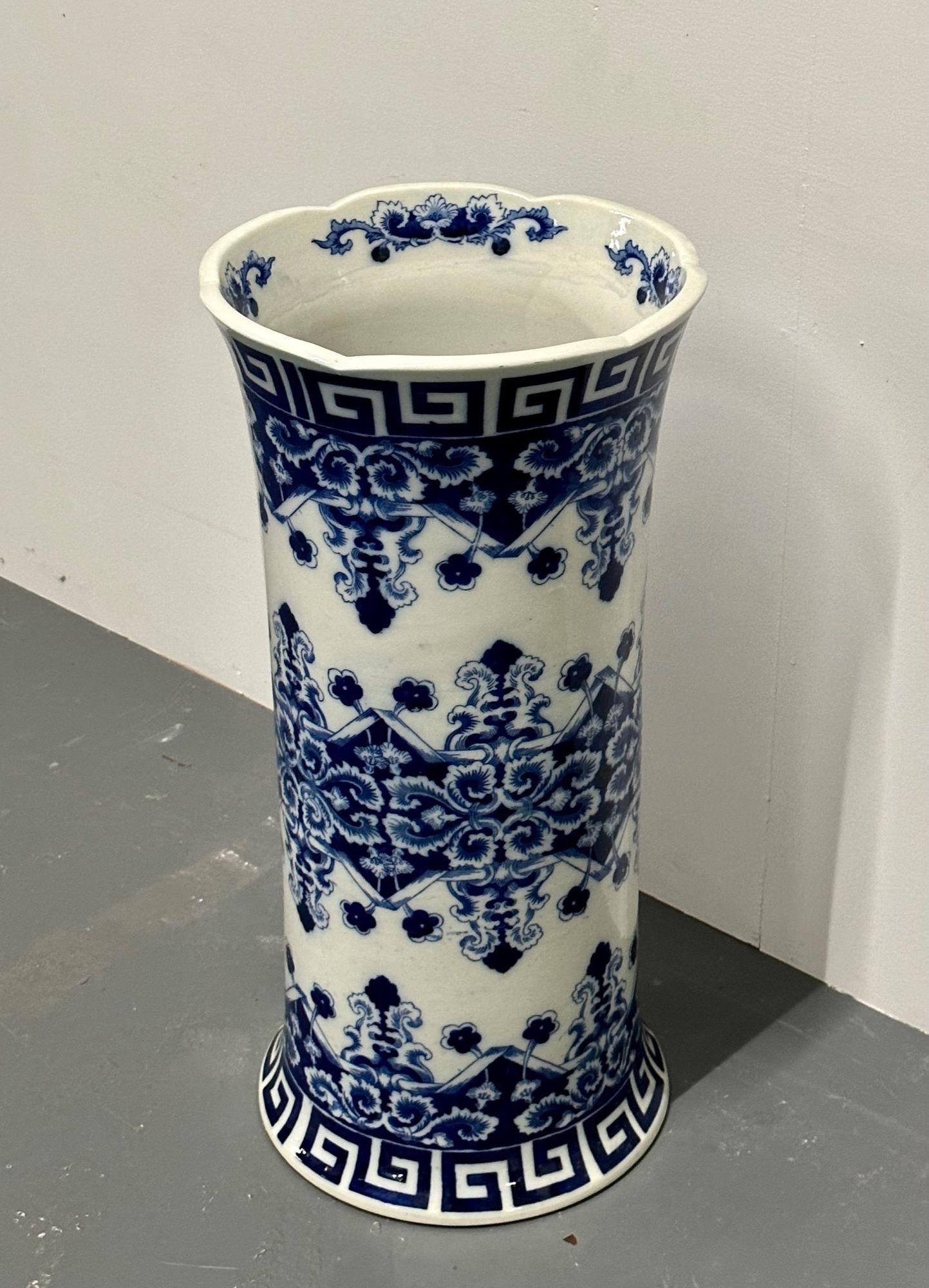 Oriental Porcelain Flow Blue White Umbrella Stand, Large Vase, Floral Decorated
 
Very pretty porcelain blue and white oriental umbrella stand or large vase. Decorated with a gorgeous blue floral and Greek key motif. 
 
SX