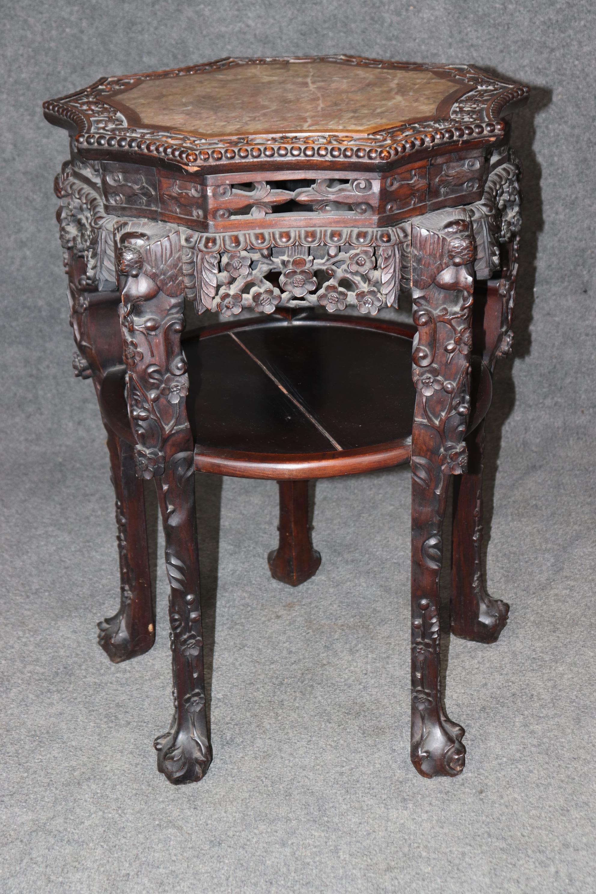 This is a gorgeous Chinese export rosewood and marble plantstand or pedestal. The table is in good condition and shows its orginal finish and has no major flaws beyond time-worn signs of age and use. Dates to teh 1870-90s era. Dimensions: 32 inches