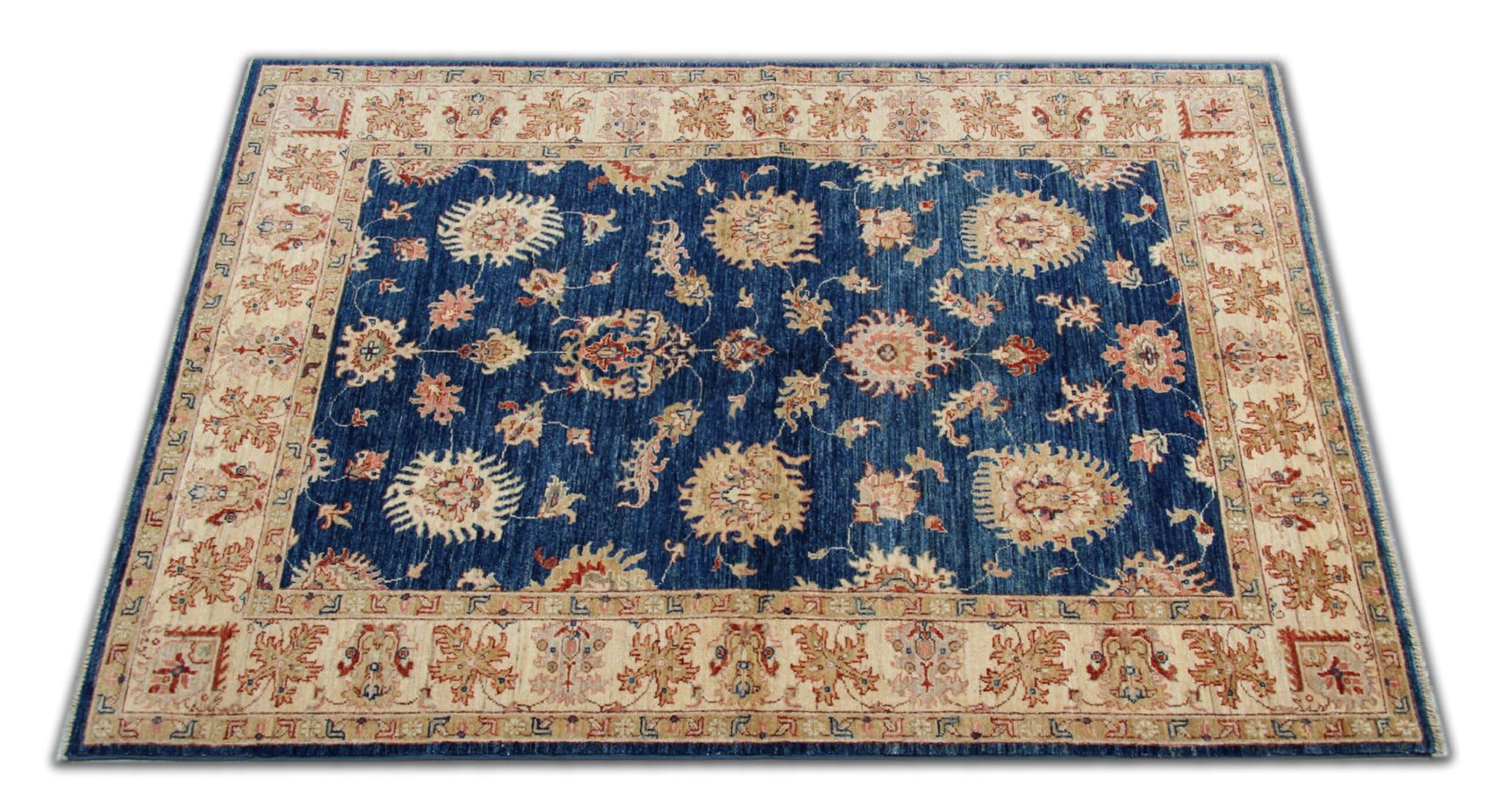 This stunning oriental rug blue Zeigler carpet elevates your living space, meticulously handcrafted to add an air of timeless elegance to any room. Ziegler rugs are renowned for their thick borders and intricate designs, combining traditional