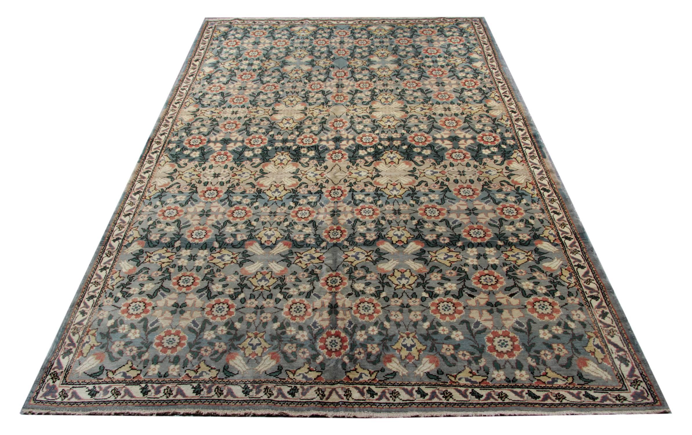 This handmade rug is an old Turkish Ushak Oushak carpet, circa 1950 and is a patterned rug with an all-over floral design 100% natural rugs made of organic dyes in excellent condition. This grey Oriental rug can be suitable for dining room or living