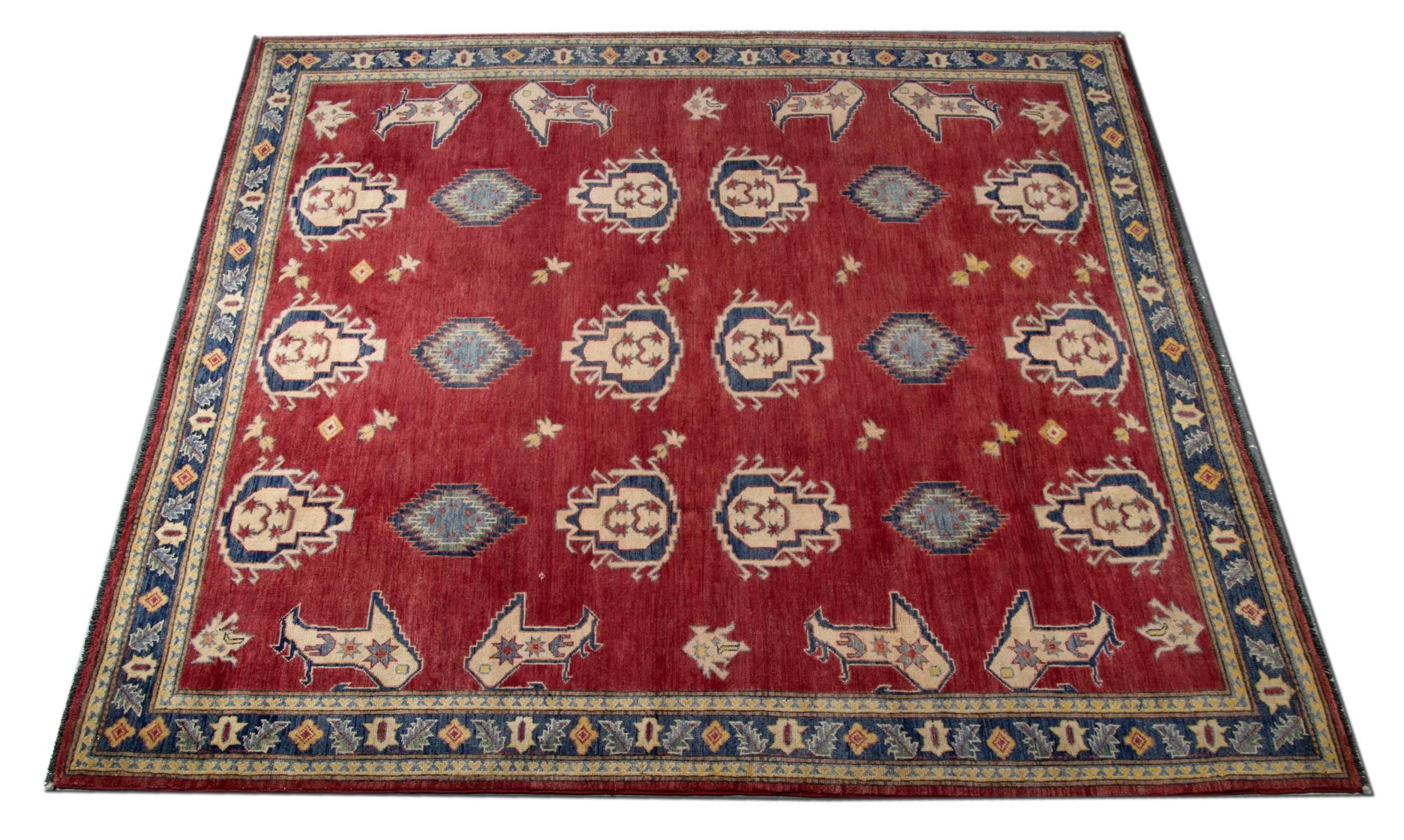 The handmade carpet elegant traditional handwoven tribal rug is made by Afghan weavers. For the production of this geometric rug are used wool and cotton. The carpet oriental rug depicts geometric designs of animals, trees and symbols which are