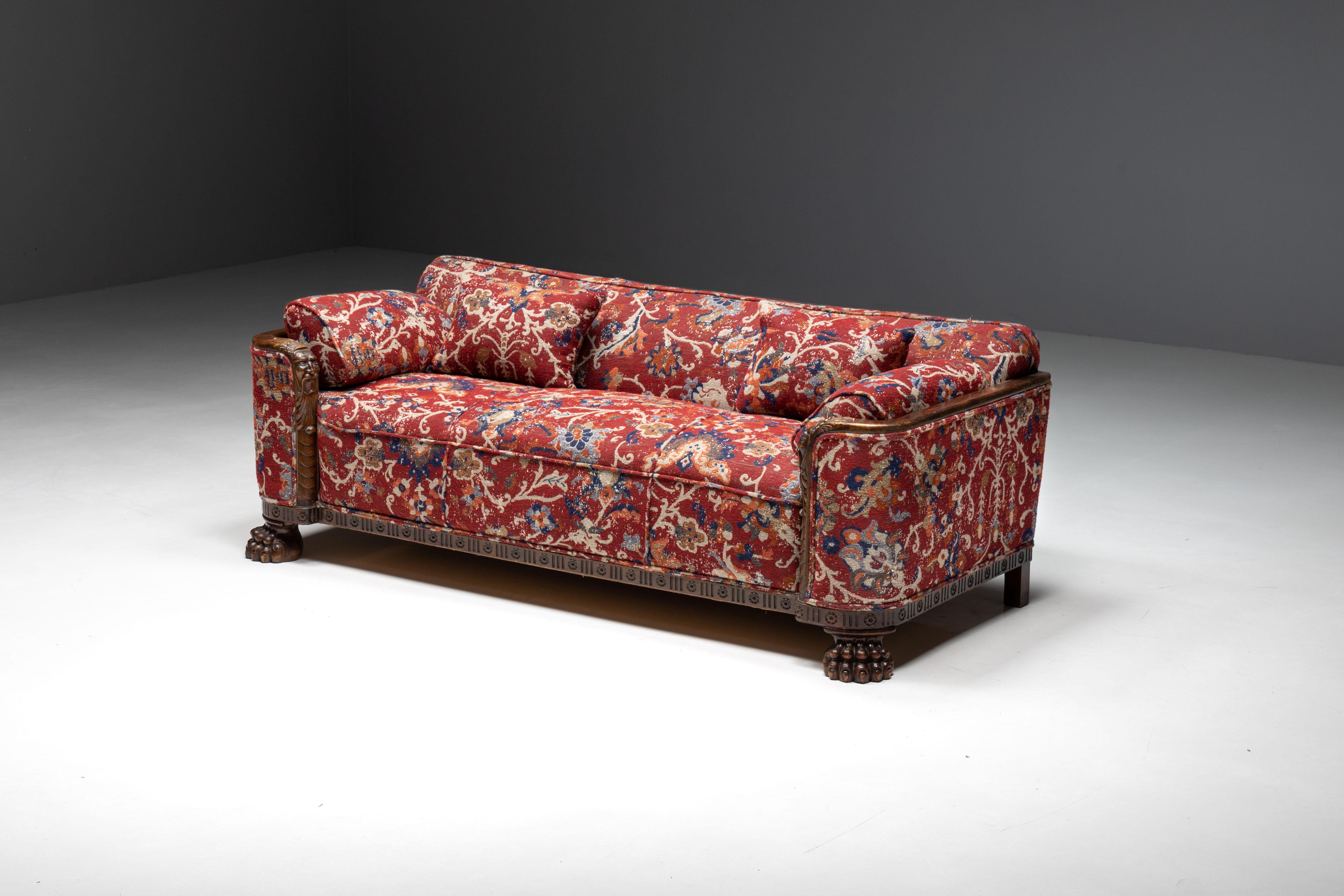 Chippendale style sofa adorned with oriental ornamentations, skilfully reupholstered in luxurious Pierre Frey fabric. This masterpiece harmoniously blends timeless design and contemporary elegance, showcasing a Persian rug reimagined in woolly
