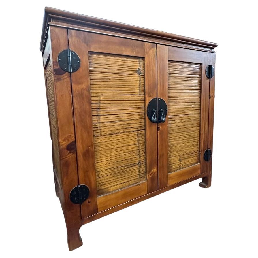 Oriental Style Wood and Rattan Cabinet For Sale