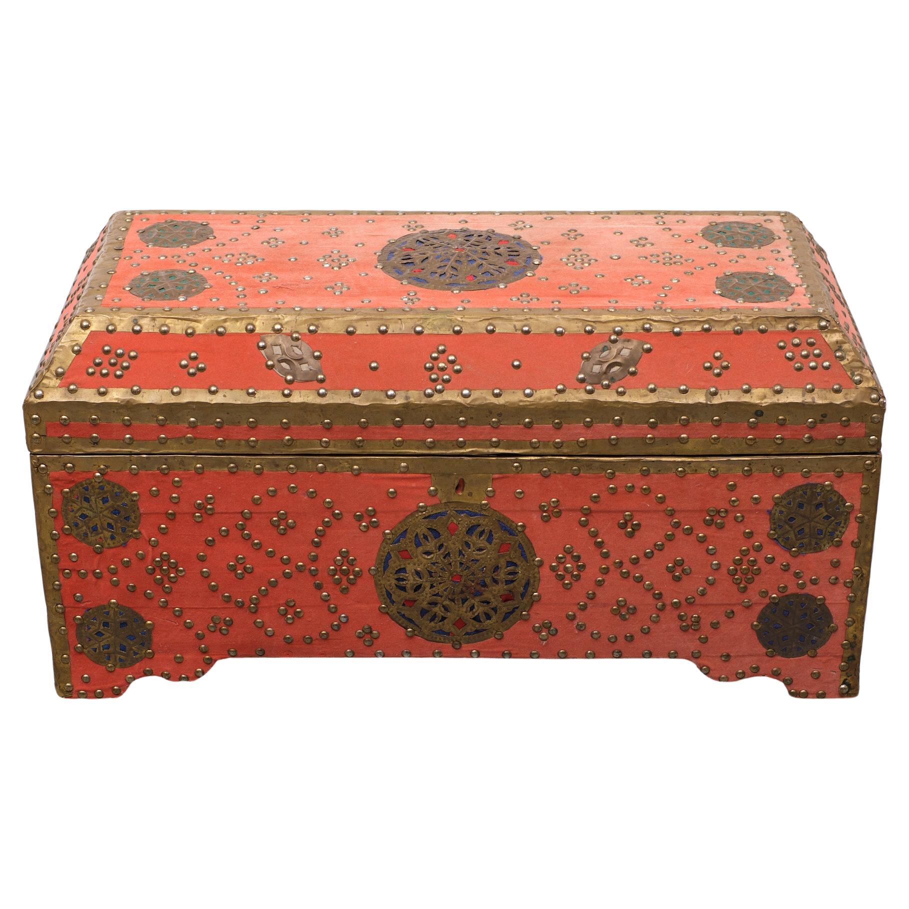 Unique and great looking chest, for your blankets or anything else. Covert with a pink velvet fabric. And decorated with brass nails and medallions. 1960s Morocco.