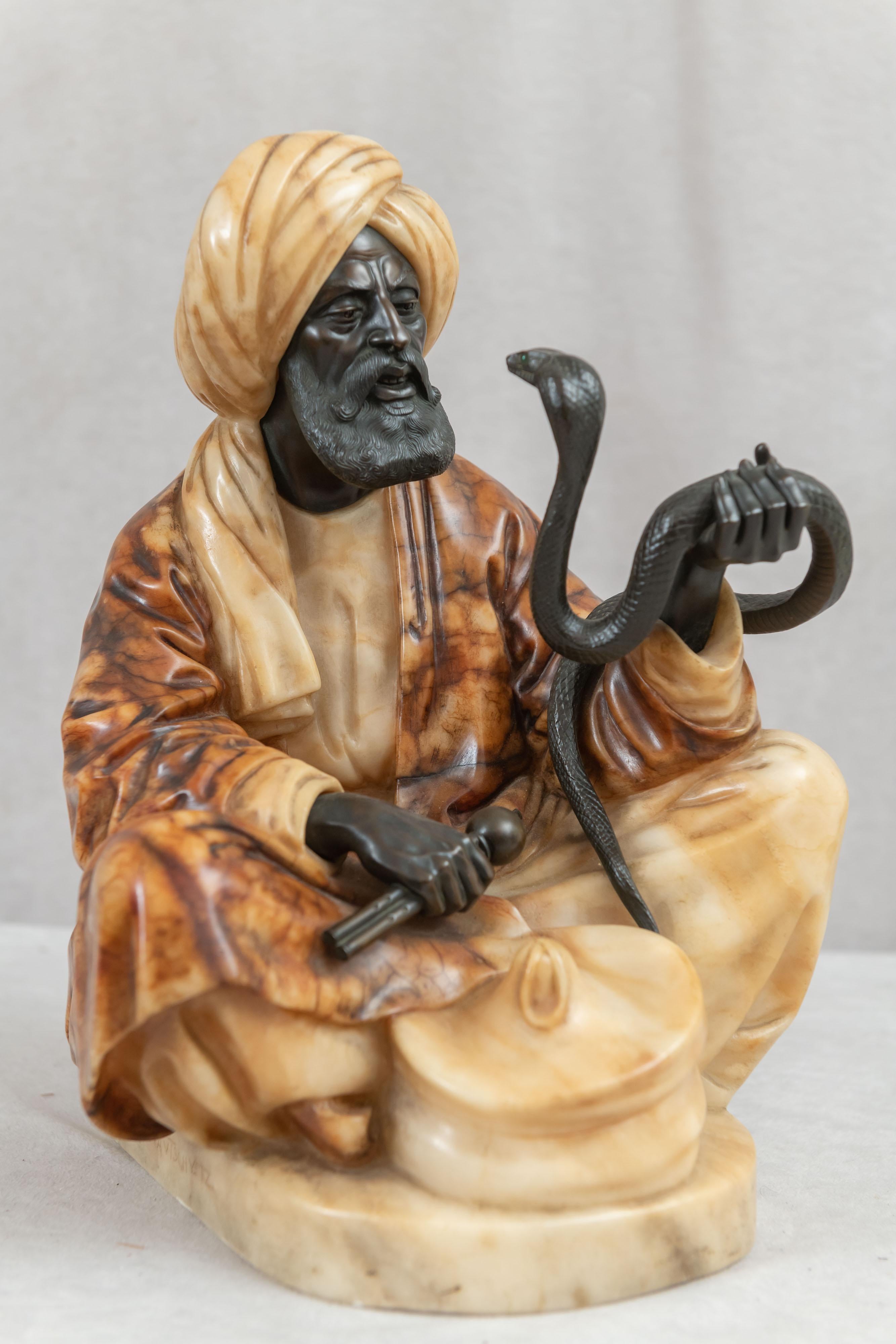 This Orientalist figure is about as lifelike as you will ever see in bronze. The expression on his face, his detailed hands and beard are all cast with an incredible attention to detail. The snake is just as well modeled to include his, ever so