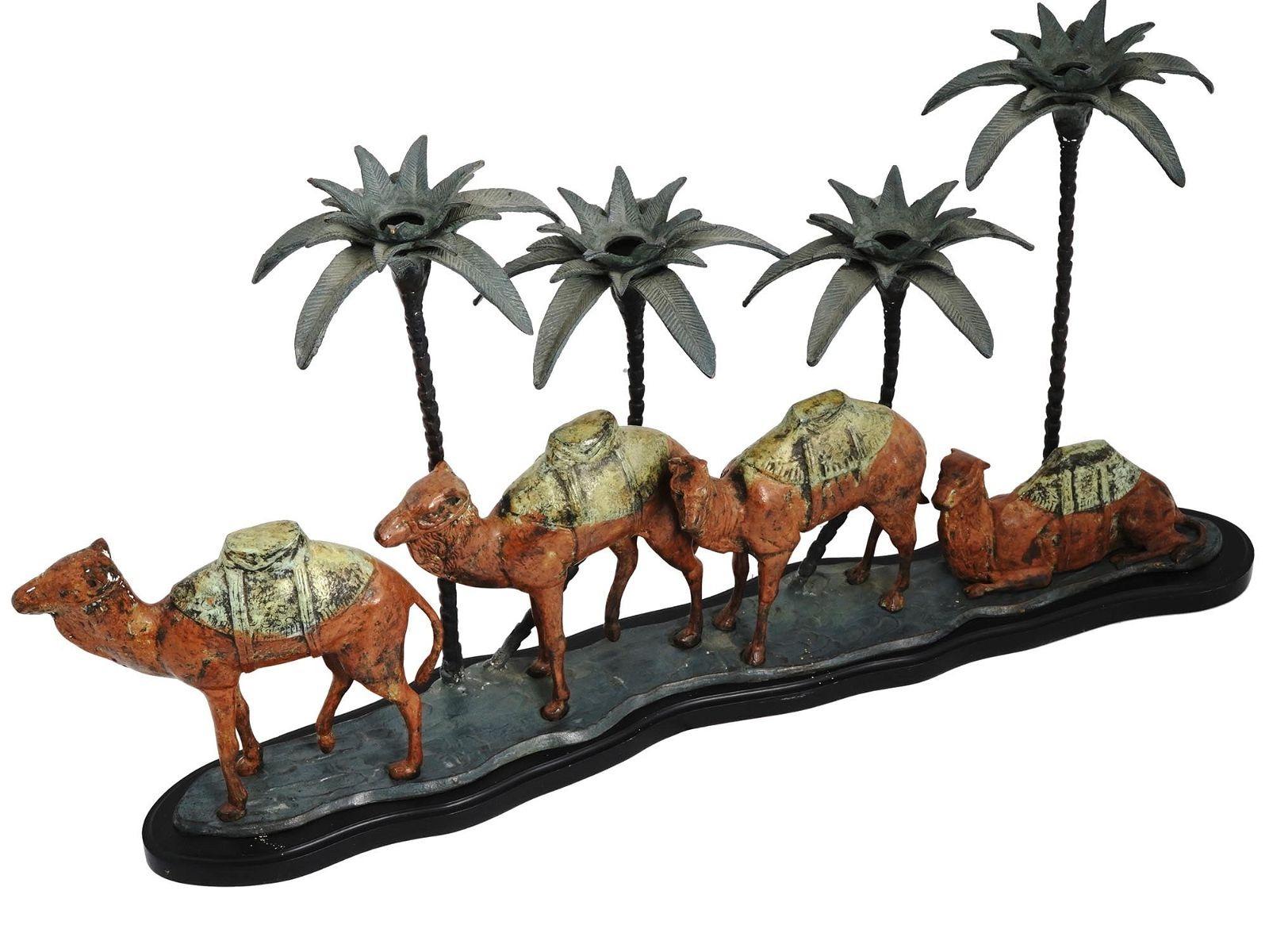 Vintage candle holder after the original Orientalist period Austrian original, depicting Middle Eastern camels with four palm tree candle holders.