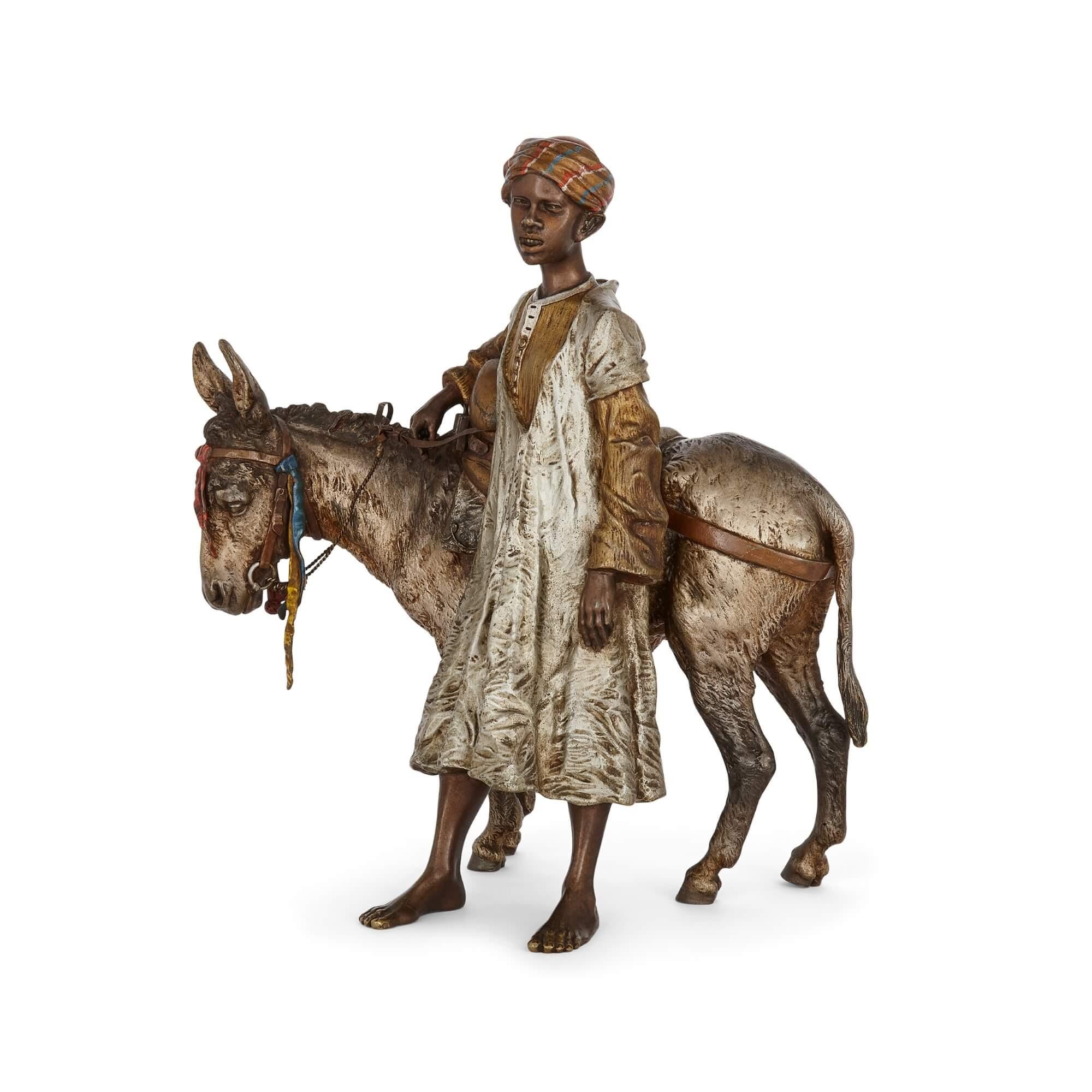 Orientalist cold-painted bronze sculpture of a boy and a donkey by Bergman
Austrian, c. 1910
Height 30cm, width 28cm, depth 17cm

Franz Xaver Bergman (Austrian, 1861-1936) utilised the very complex technique of cold-painting bronze to craft this