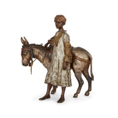 Orientalist Cold-Painted Bronze Sculpture of a Boy and a Donkey by Bergman
