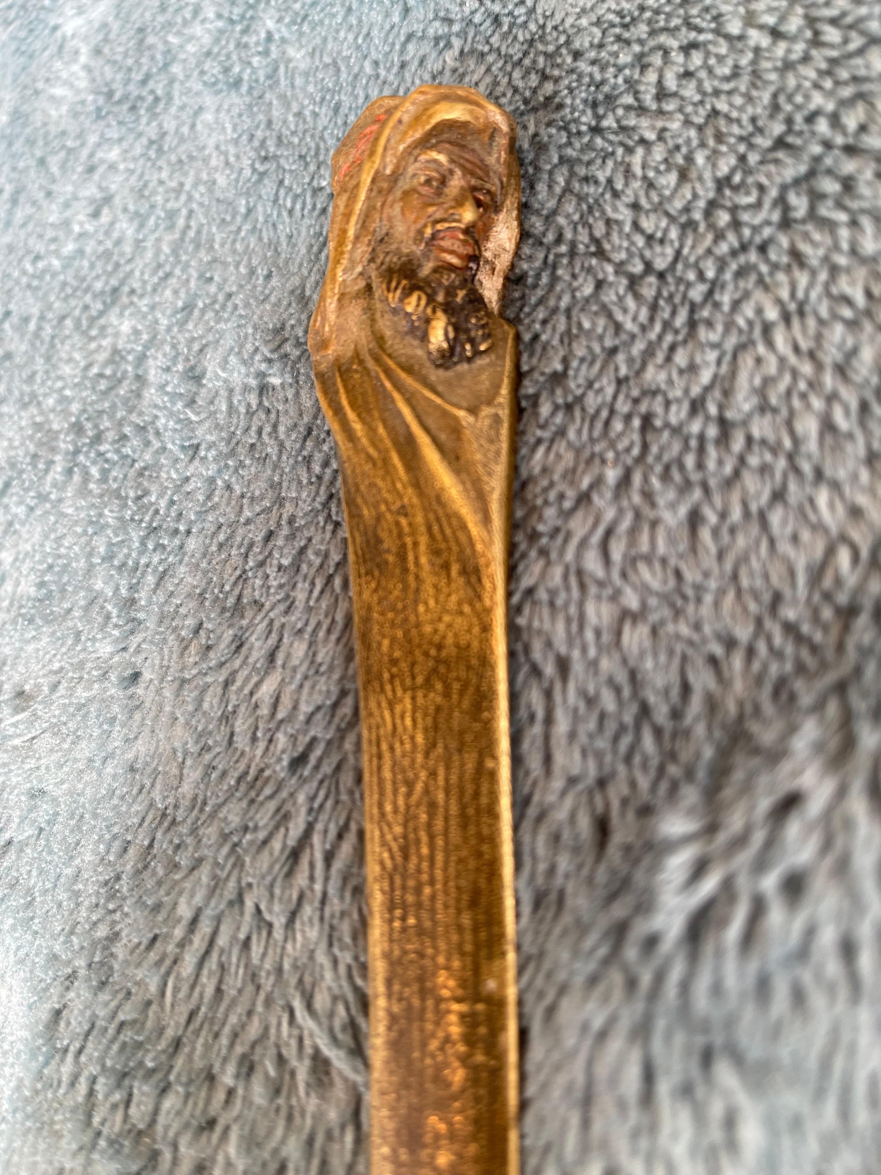  This letter opener, most likely done by the Bergmann Foundry is extremely rare. We have sold countless inkwells, bookends, lamps and other accessories for the desk, but the letter opener just never shows up. The man's face is nicely cast at the top