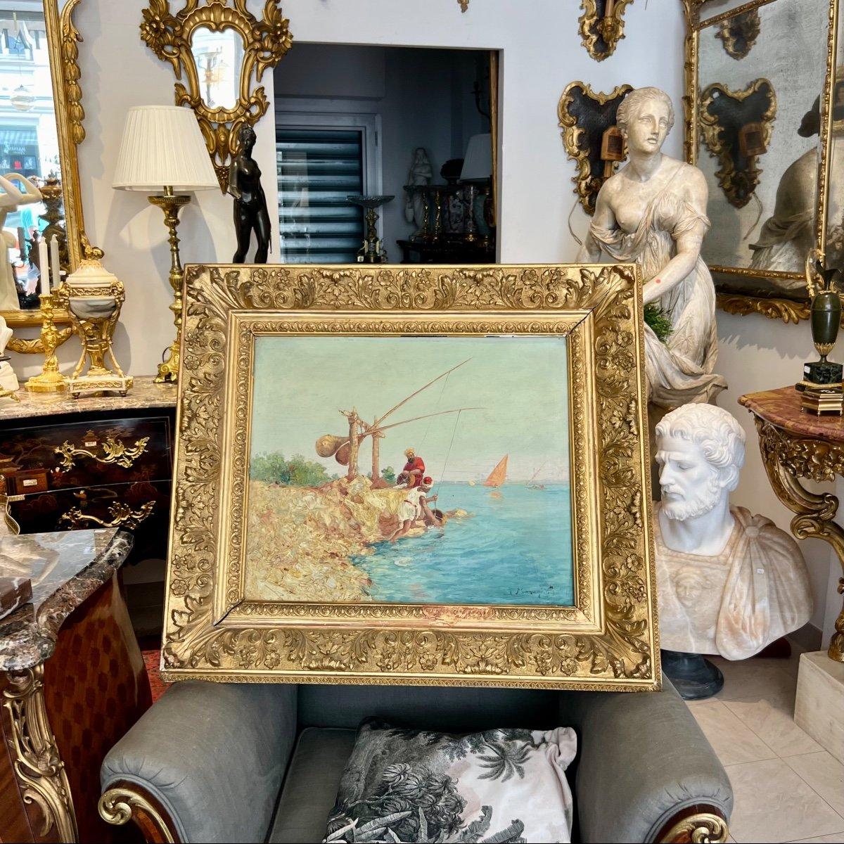 Vincent Manago's painting depicts an orientalist scene rich in detail and colour - typical of the late 19th century. The artist has meticulously captured characteristic elements of the Orient. The colours used are vibrant and rich, evoking the