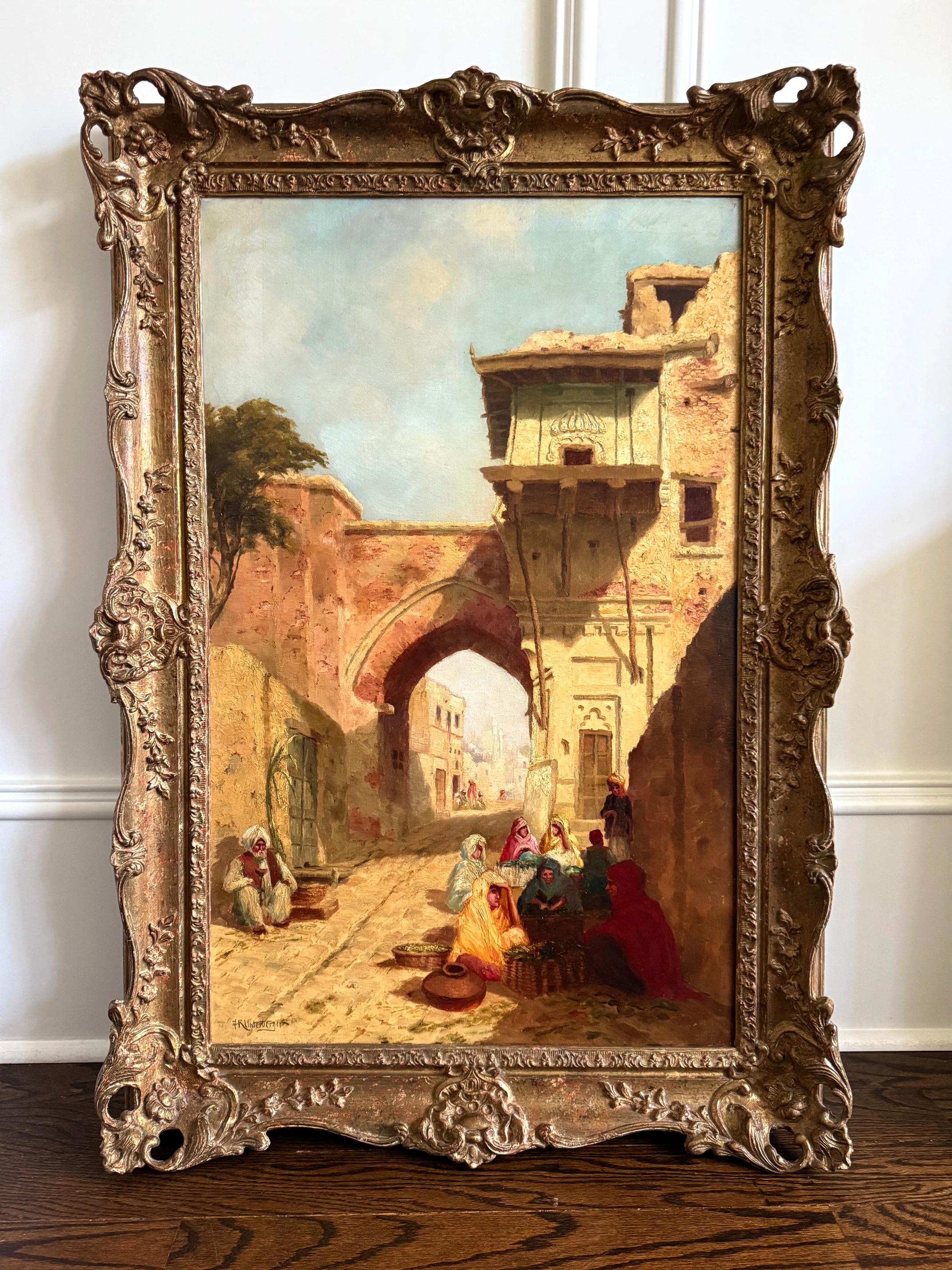 Ein beeindruckendes orientalisches Ölgemälde des österreichischen Künstlers Franz Richard Unterberger (1838-1902) in einem zeitgemäßen und kunstvoll geschnitzten Rahmen aus vergoldetem Holz. Das Gemälde zeigt einen behelfsmäßigen Straßenmarkt mit