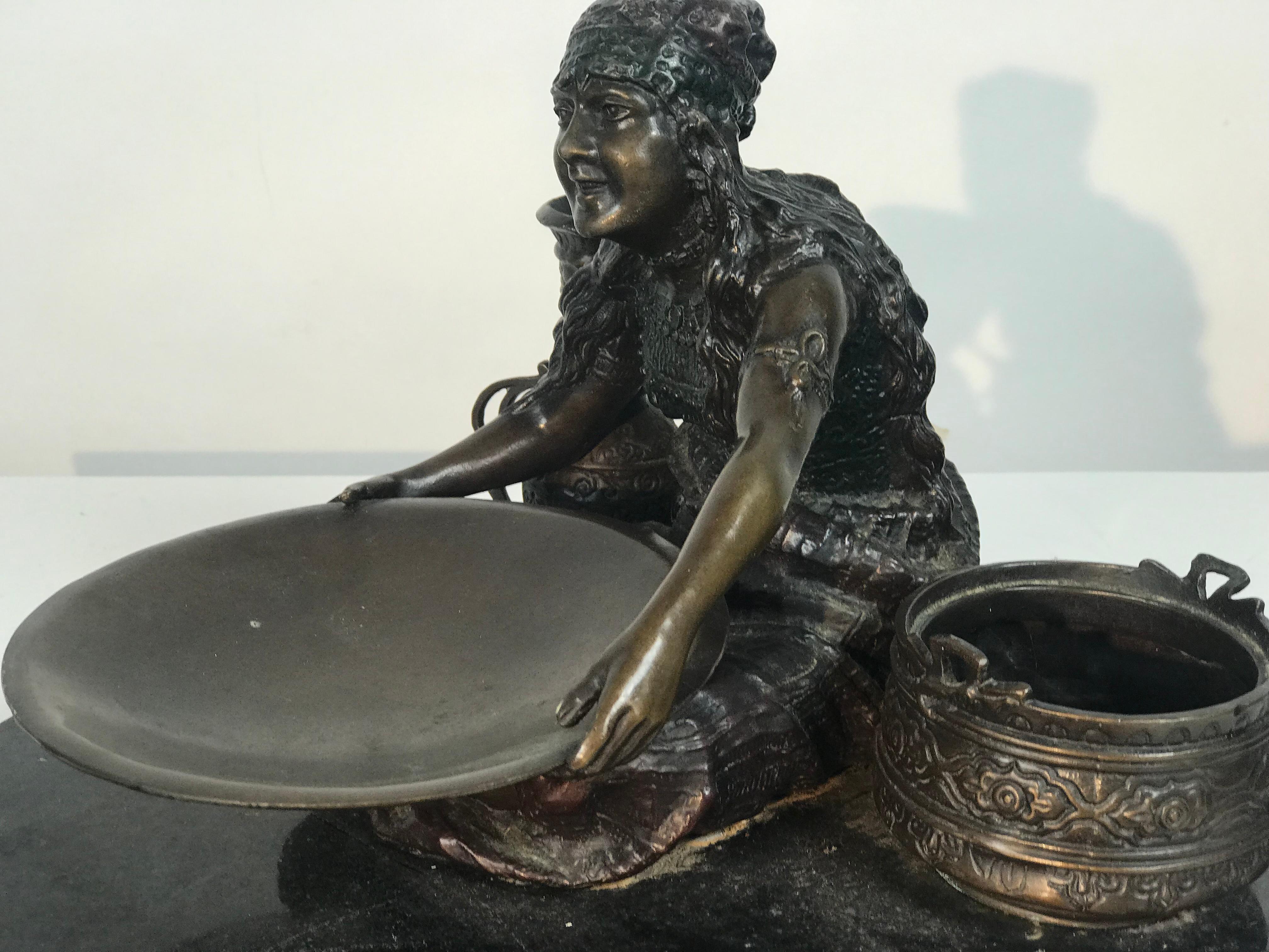 Orientalist Vienna bronze sculpture by Franz Xaver Bergmann (Nam Greb) ,, Stunning depiction of woman with serving dish, exquisite detailing .Wonderful warm bronze patina,, Signed and monogrammed. Sculpture mounted on marble base.