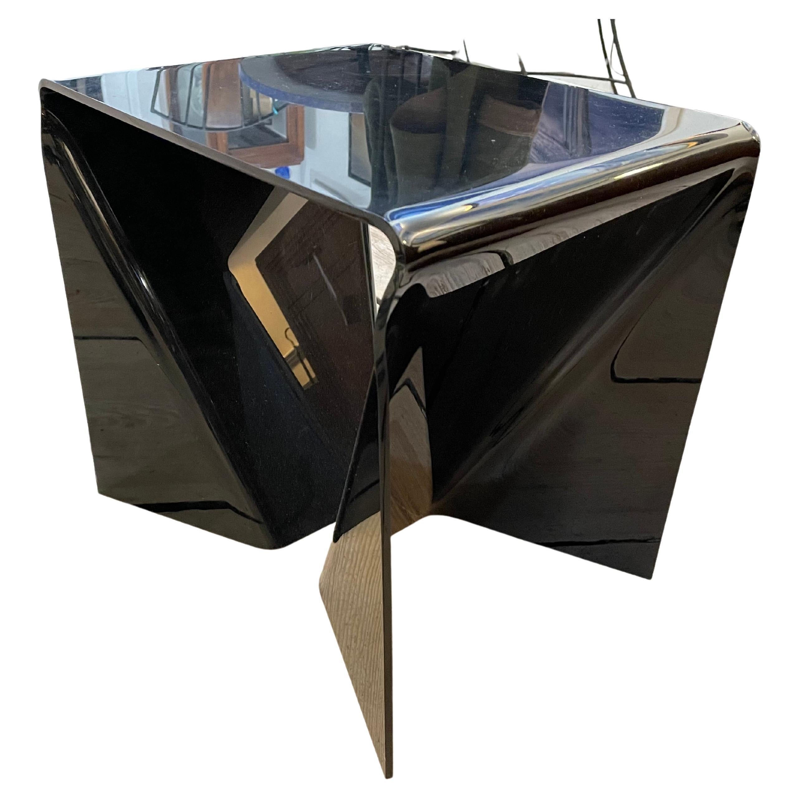 By Neal Small, a black Lucite origami coffee or side table. Mid-Century Modern, American. 1960's. Great architectural sculptural form and style.