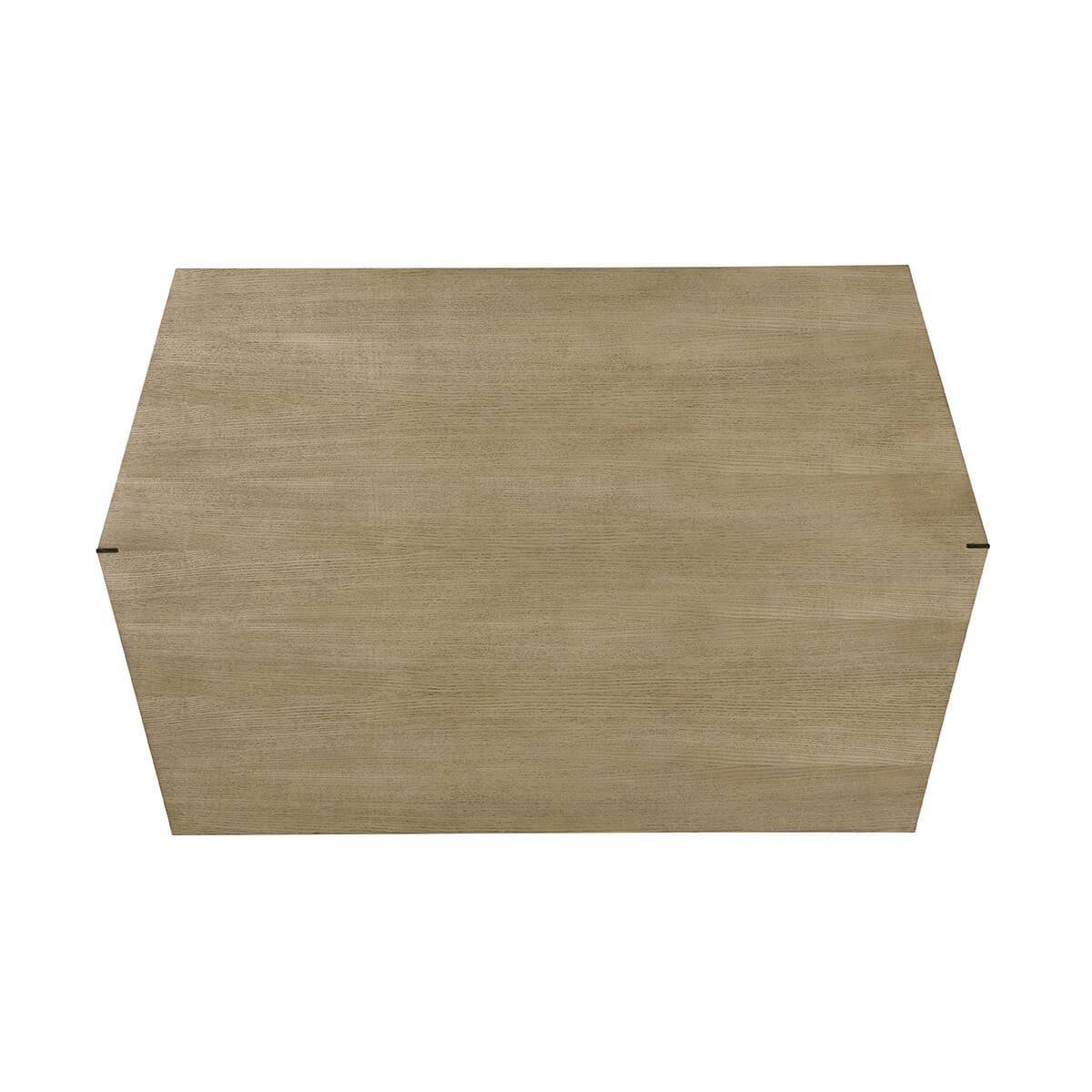 features a contemporary design with faceted planes reminiscent of the simple complexity of origami art. Veneered in Ash, featured in our natural Dune finish, outlined with brass detailing.
Dimensions: 58.5
