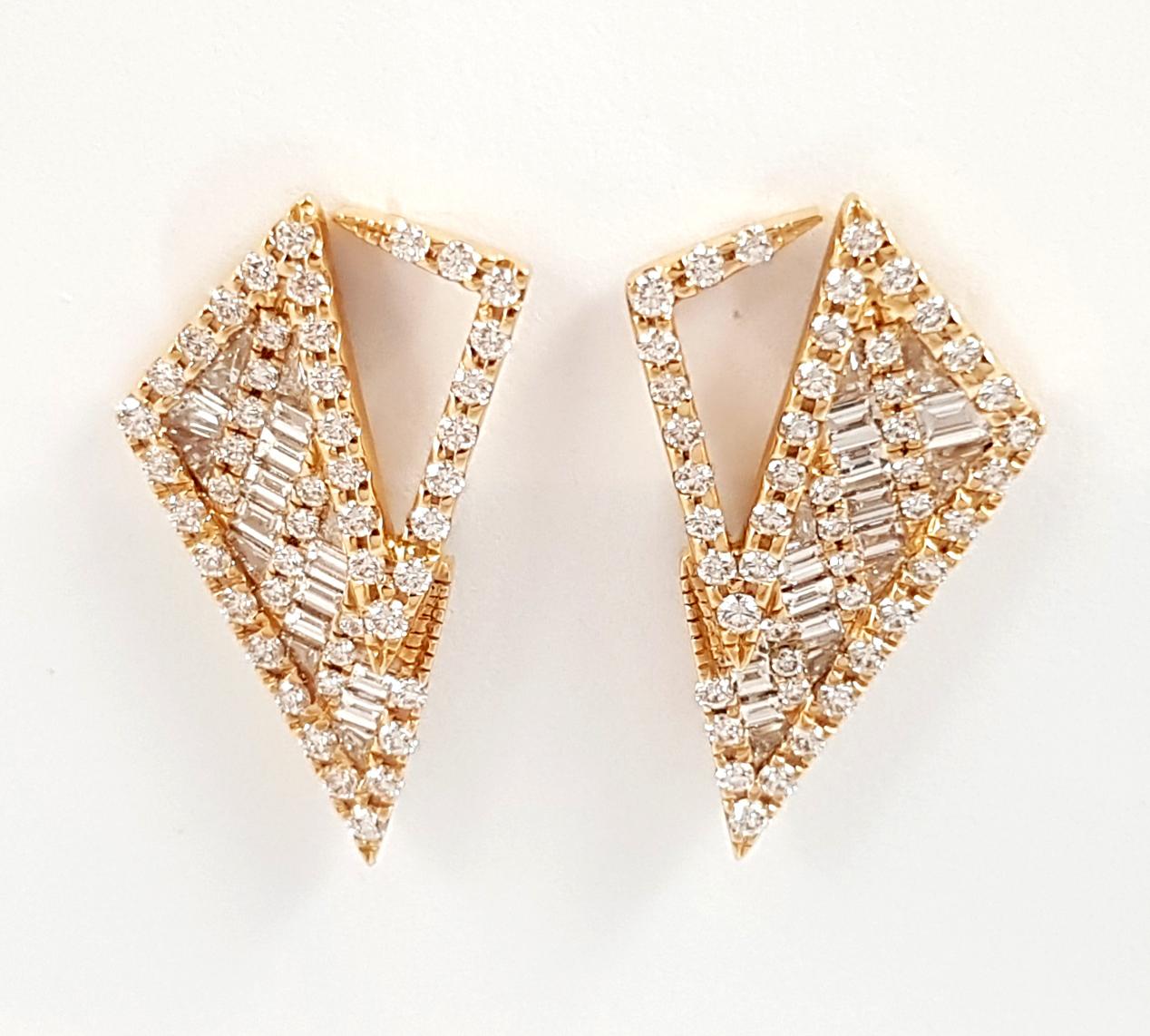 Diamond 2.21 carats Earrings set in 18K Rose Gold Settigs

Width: 1.5 cm
Length: 2.6 cm
Weight: 7.02 grams

The ancient Japanese tradition of paper folding has inspired the form and elements of this modern collection. With a series of folds and