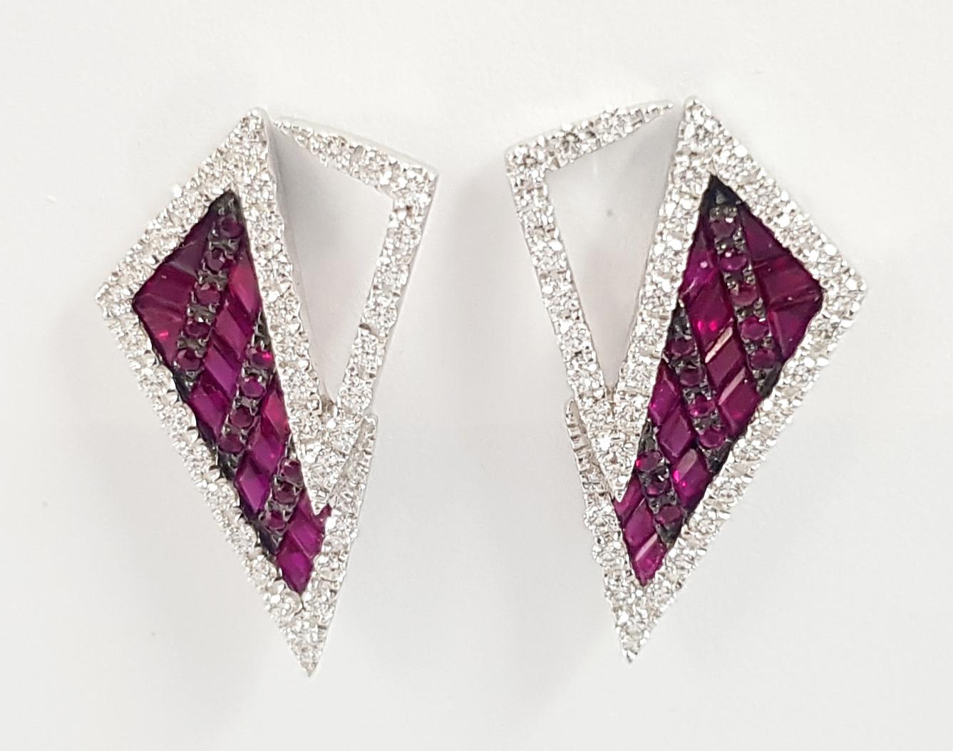 Ruby 2.71 carats with Diamond 0.20 carat Earrings set in 18K White Gold Settings

Width: 1.5 cm
Length: 2.6 cm
Weight: 7.92 grams

The ancient Japanese tradition of paper folding has inspired the form and elements of this modern collection. With a