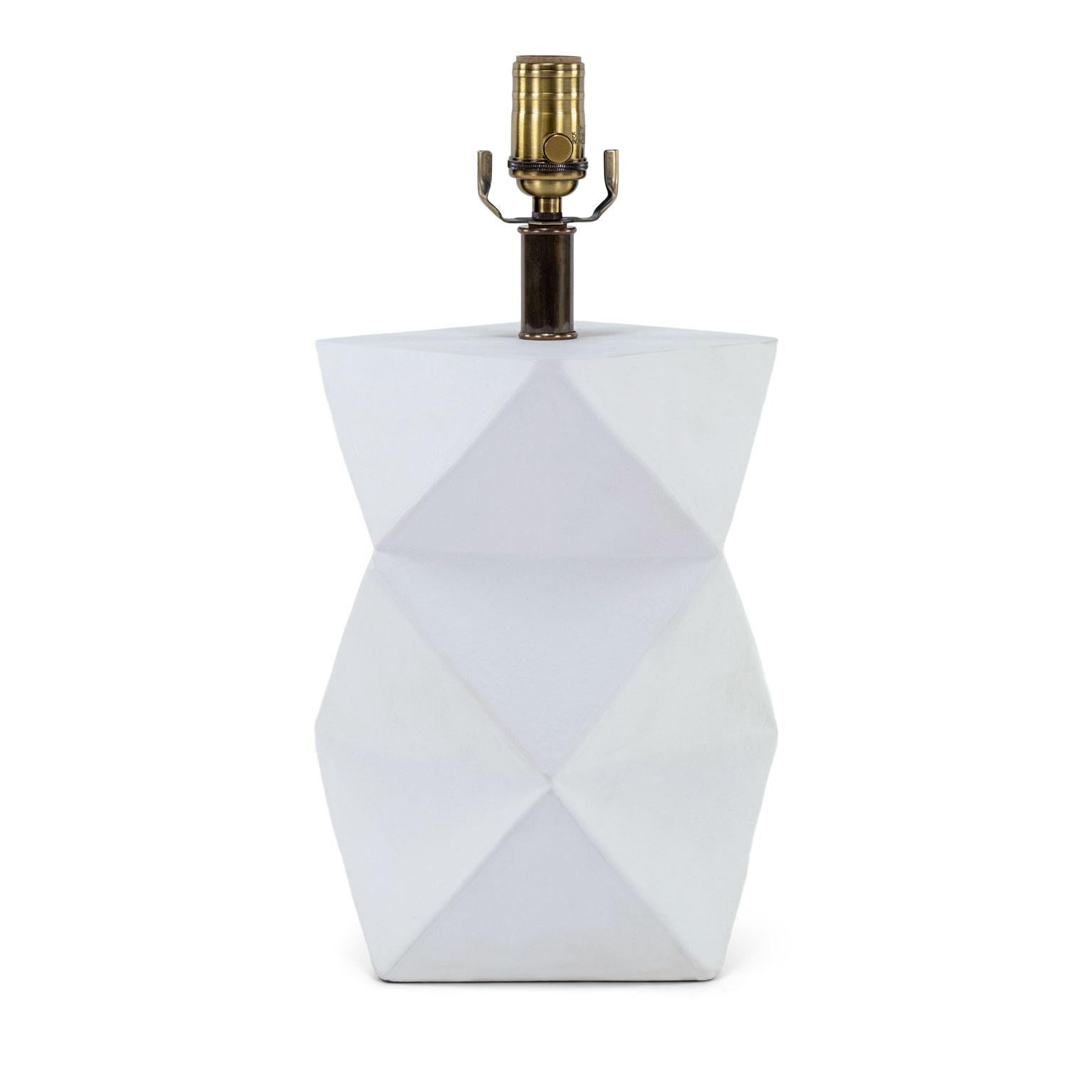 'Origami' white plaster lamp, by Liz Marsh. Geometric abstract shaped table lamp artist-sculpted to resemble Japanese origami. Wired for use within the USA using UL approved parts. Accommodates medium-size dimmer bulb. Includes complimentary black