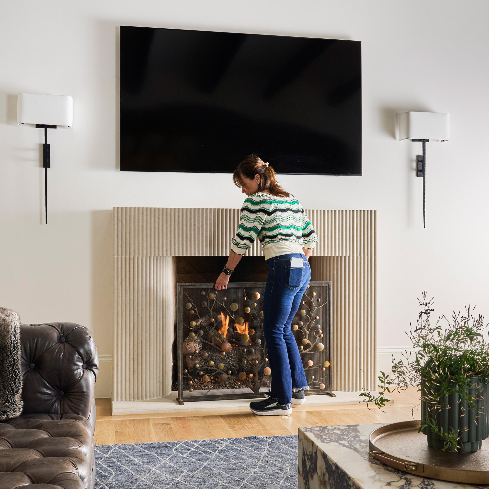 With its branching tree of life silhouette and richly patinated discs, the Origin Fireplace Screen makes a bold, sculptural statement. Each disc is hand-finished, offering unique variations in tone and texture that bring depth and character to the
