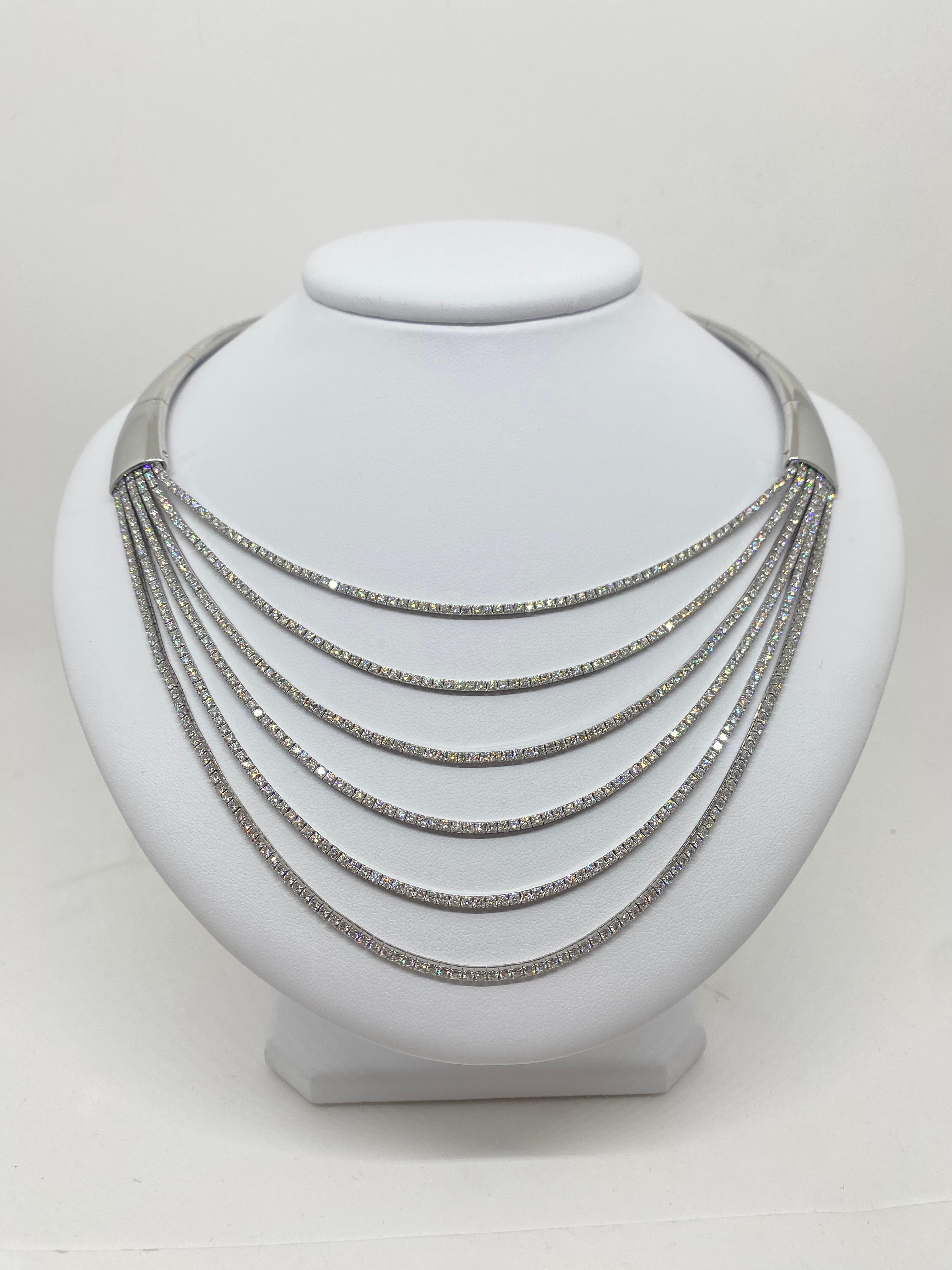 Mattia Cielo signed necklace made of 18kt white gold with natural brilliant-cut diamonds for 12.85 ct.

Welcome to our jewelry collection, where every piece tells a story of timeless elegance and unparalleled craftsmanship. As a family-run business