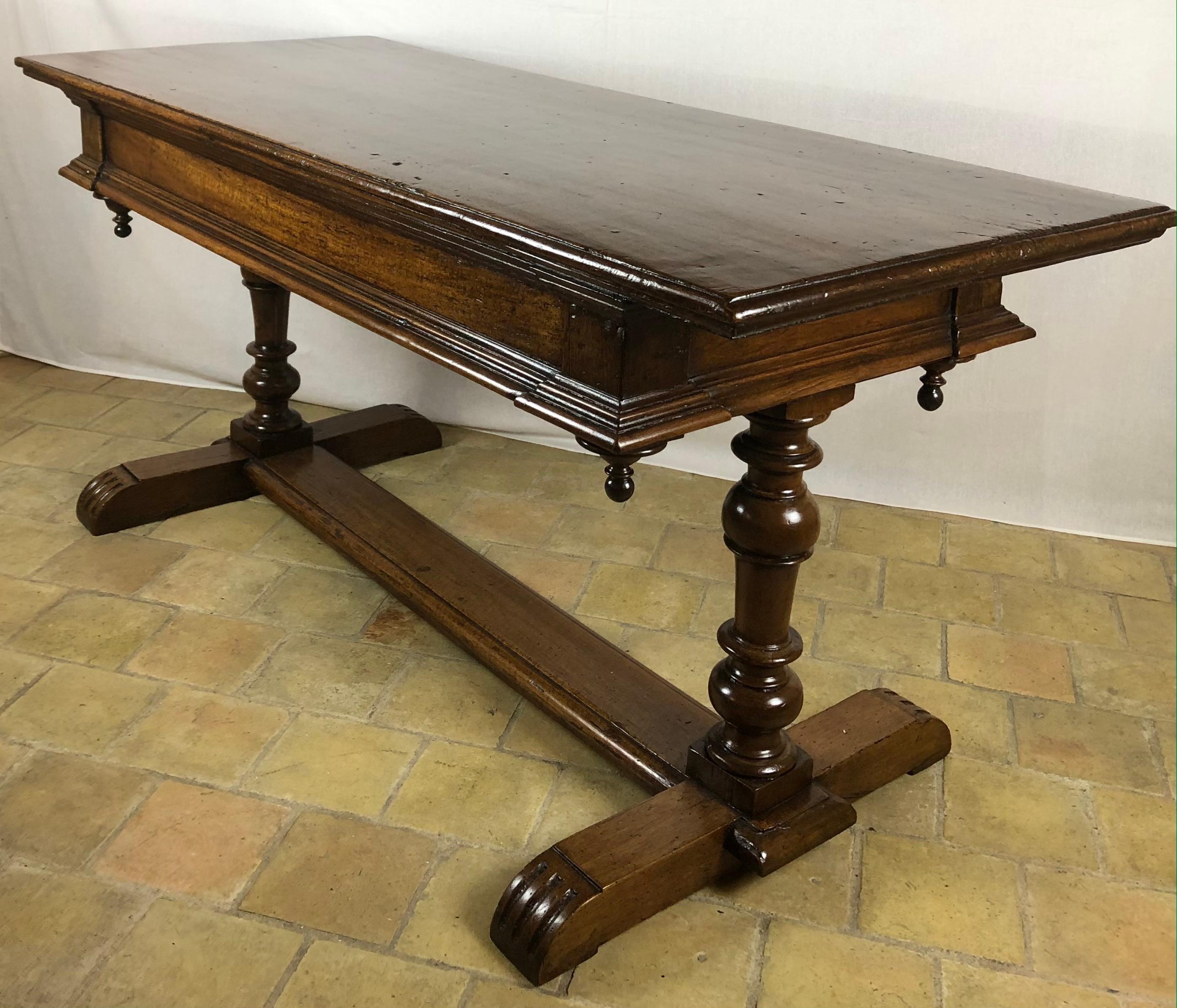 A very good quality 18th century French Louis XIII style rectangular sofa console or display table. This table is made of strong walnut wood and is a multi functional table. It is raised by two beautiful turned legs and their original and large