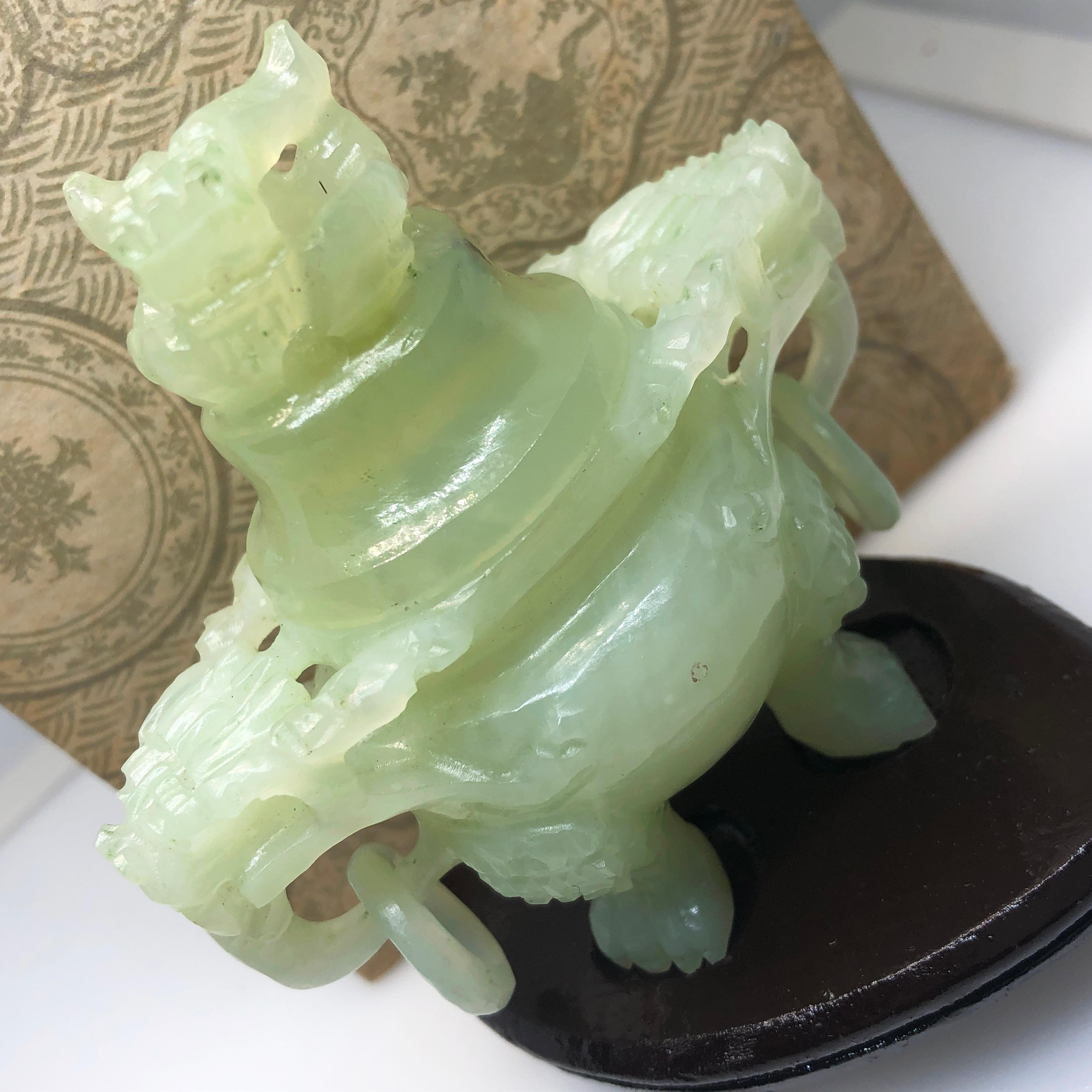 One-of-a-kind, Original 1930, Chinese Export Natural Pale Jade Perfume Burner. Hand Carving and Engraving Work is Beautiffully Crisp and Detailed.
This Unique Piece is still in excellent conditions.
With a wood fitted stand and chinese fitted