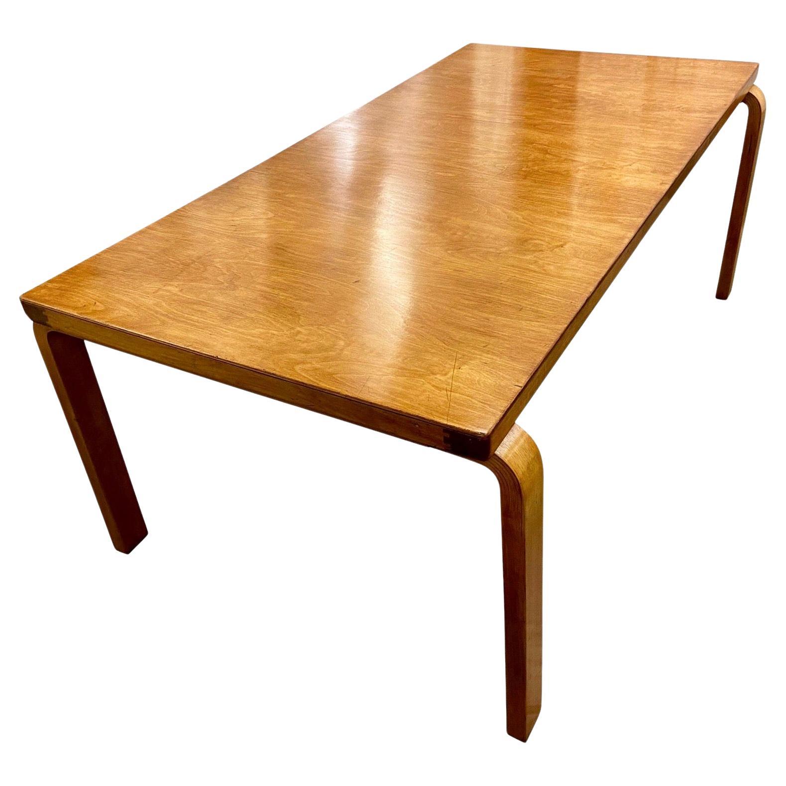 Rare large size original 1930's modernist early Alvar Aalto L-Leg plywood desk, dining, conference or library table. beautiful patina.
numbered legs and 1930's Finmar label.
Manufactured by O.y. Huonekalu-ja Rakennustyotehdas A.b., Turku, Finland