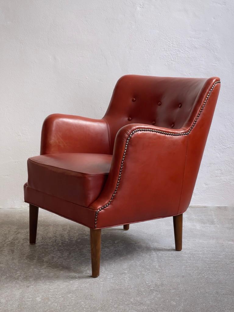 Scandinavian Modern Original 1940s danish modern easy chair in patinated leather with brass nails. For Sale