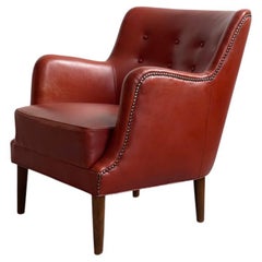 Original 1940er Jahre dänischer moderner Sessel aus patiniertem Leder mit Messingnägeln.