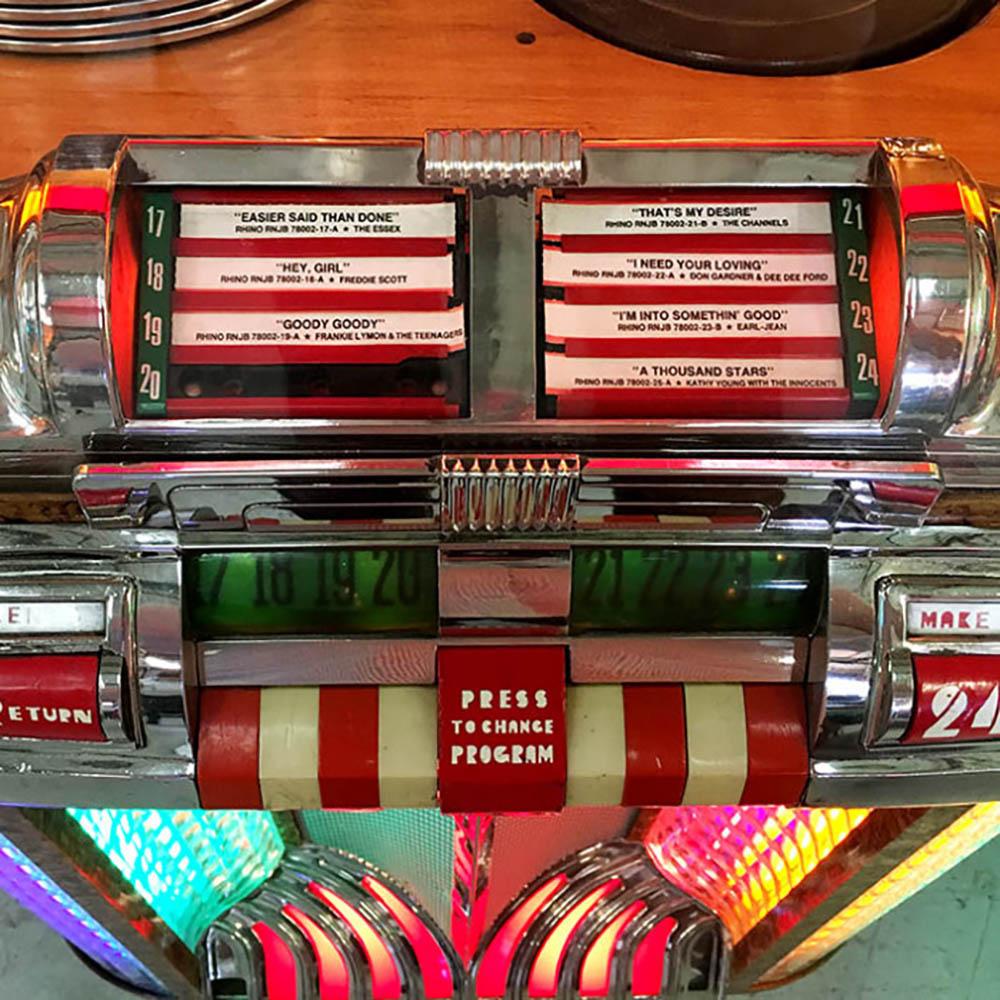 Nicknamed ‘The Bullet’ and following hot on the heels of the iconic 1015 came the Wurlitzer 1100, which is often said to be one of the prettiest jukeboxes ever made. Its nickname derives from the overall shape, which rises to a subtle point in the