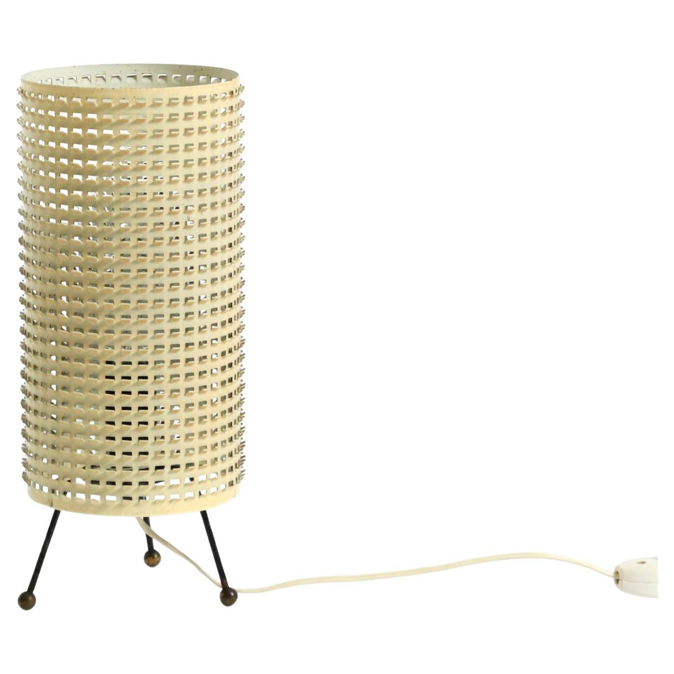 Original 1950s brass tripod table lamp with a perforated metal lampshade