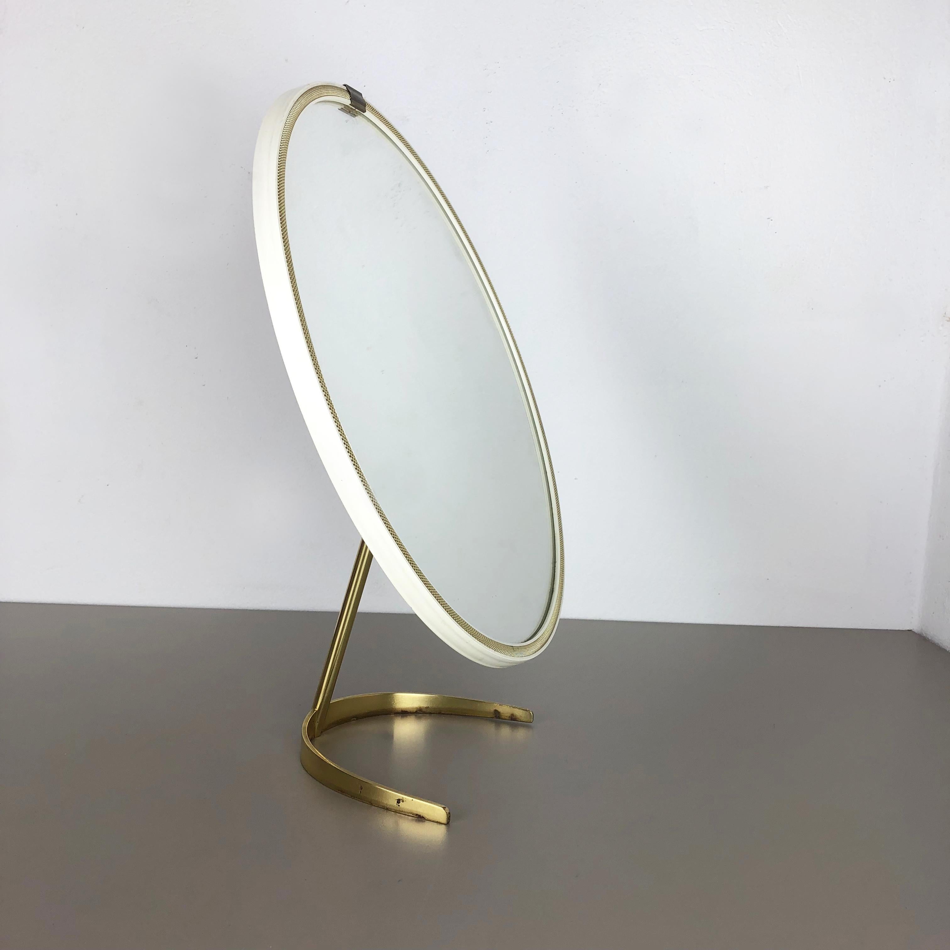 Article:

Table mirror


Producer:

Vereinigte Werkstätten München attrib.


Origin:

Germany


Material:

Wood, glass, metal


Decade:

1950s


Description:

This original midcentury table mirror was produced in the 1950s