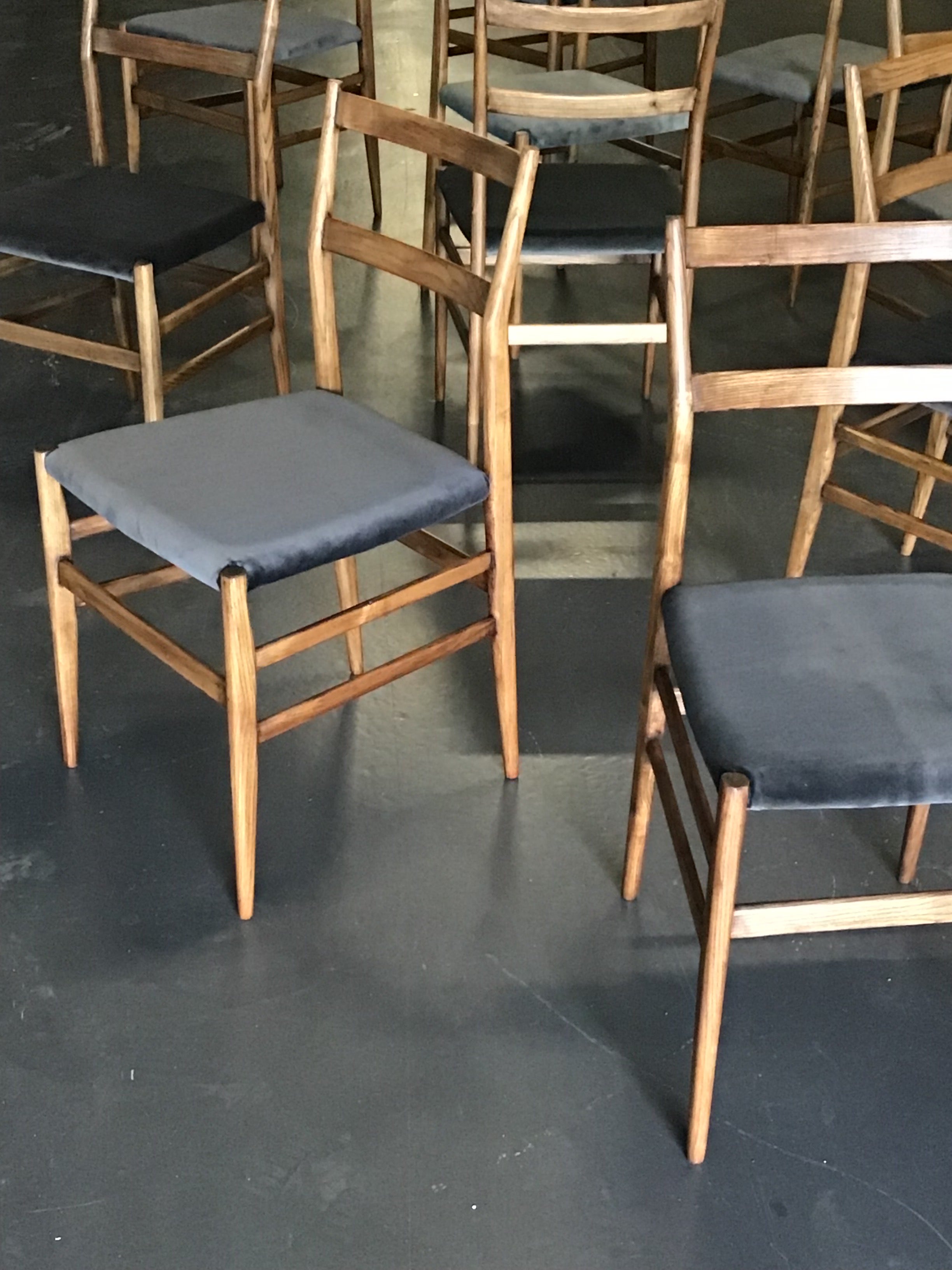 A rare set of 10 Gio Ponti Leggera dining chairs.

These chairs were in black lacquer finish but we have had them stripped back to the original ash wood in which these chairs were originally made.

They have been refinished in an antique wax which