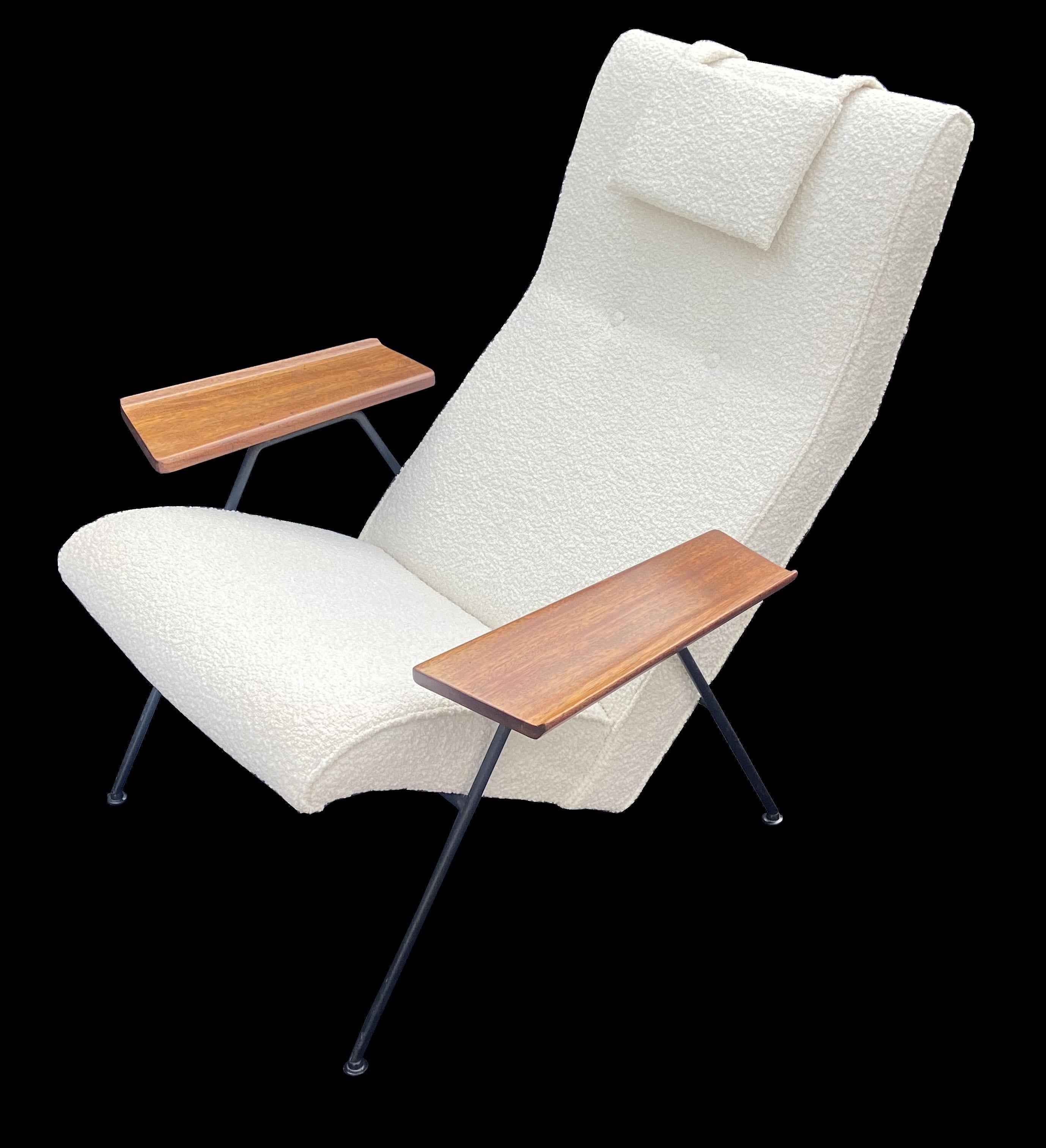 This is a stunning Original Robin Day Lounge Chair, freshly upholstered in a white boucle.
The species of Mahogany on the arms is Utile or Sipo and not on endangered species lists.