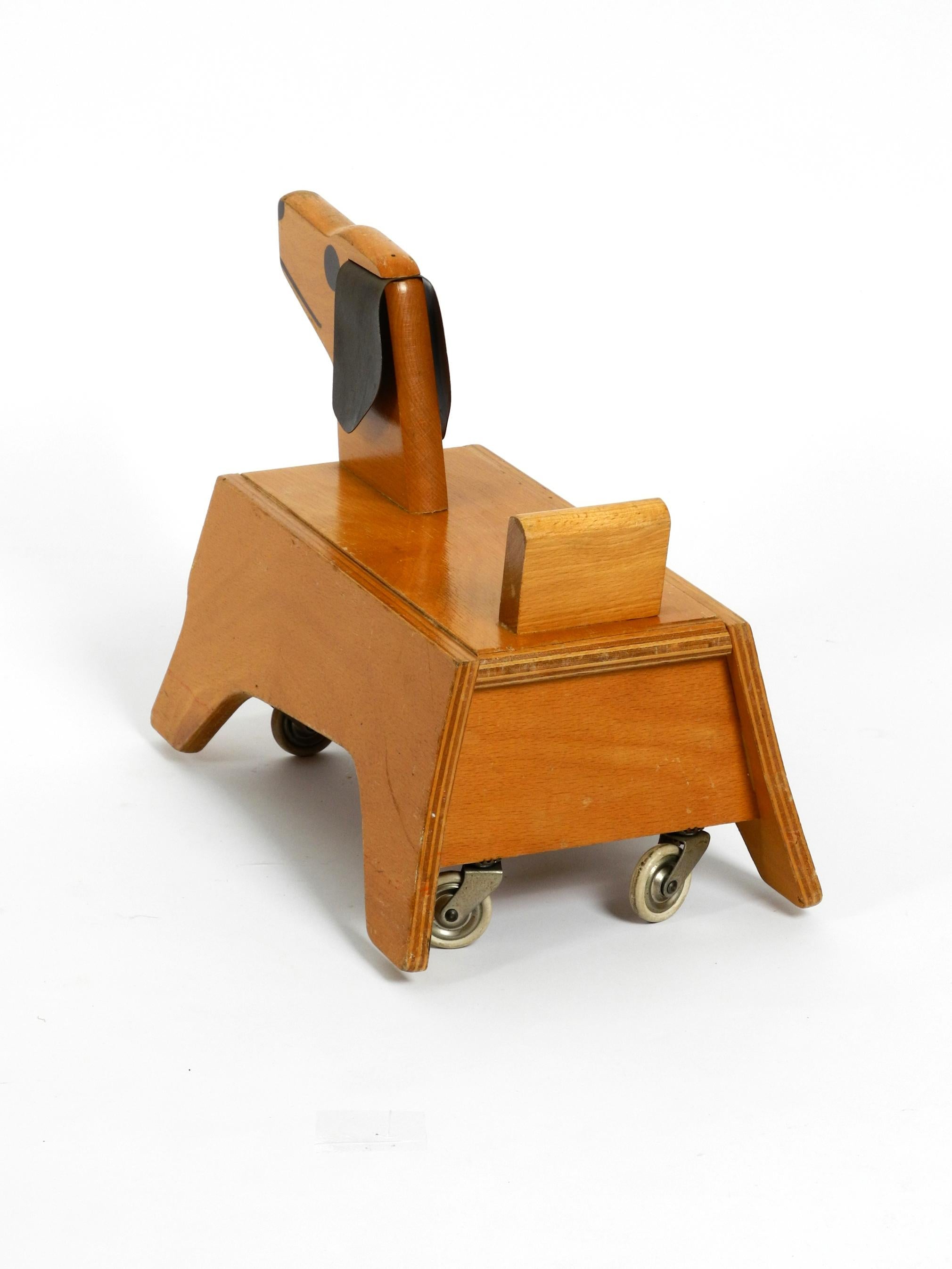 Mid-Century Modern Original 1960s Baby Toddler Vehicle Wooden Dog Made of Plywood by Konrad Keller