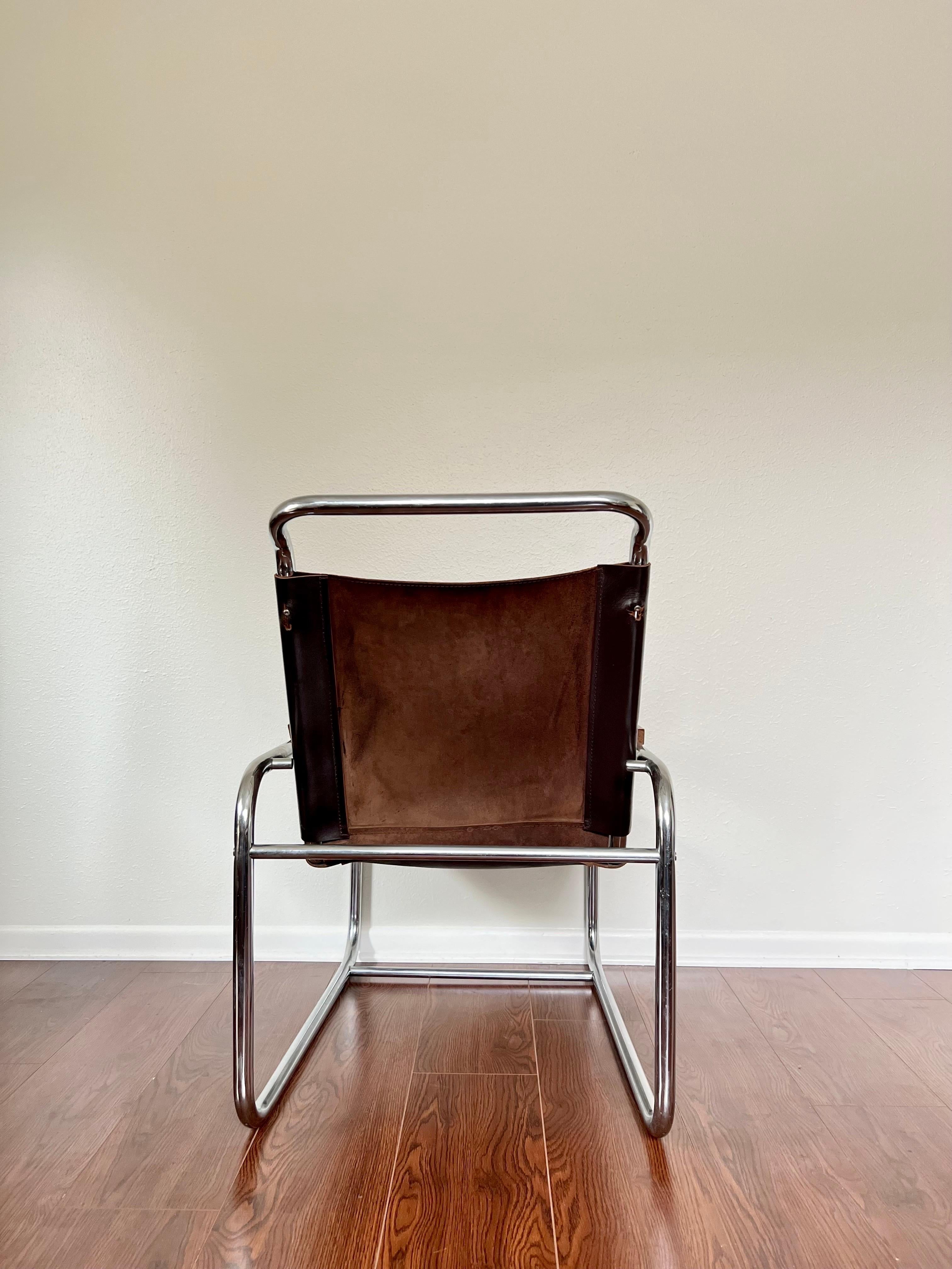 Original 1960s cantilever Marcel Breuer B35 brown leather lounge chair with wood arm rests. Leather and chrome are in great vintage condition. The comfiest and most stylish chair you will ever sit in. 

Dimensions:
34” H x 24” W x 32” D
Seat