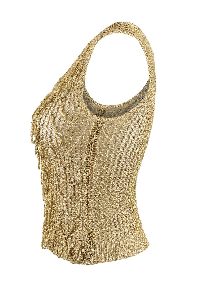 This desirable 1960s crochet vest top in gold lame thread is a rare find and is in absolutely impeccable vintage condition. Sleeveless with a scoop neckline and cinched waistband, the front features mermaid-style tassel embroidery of lame chord