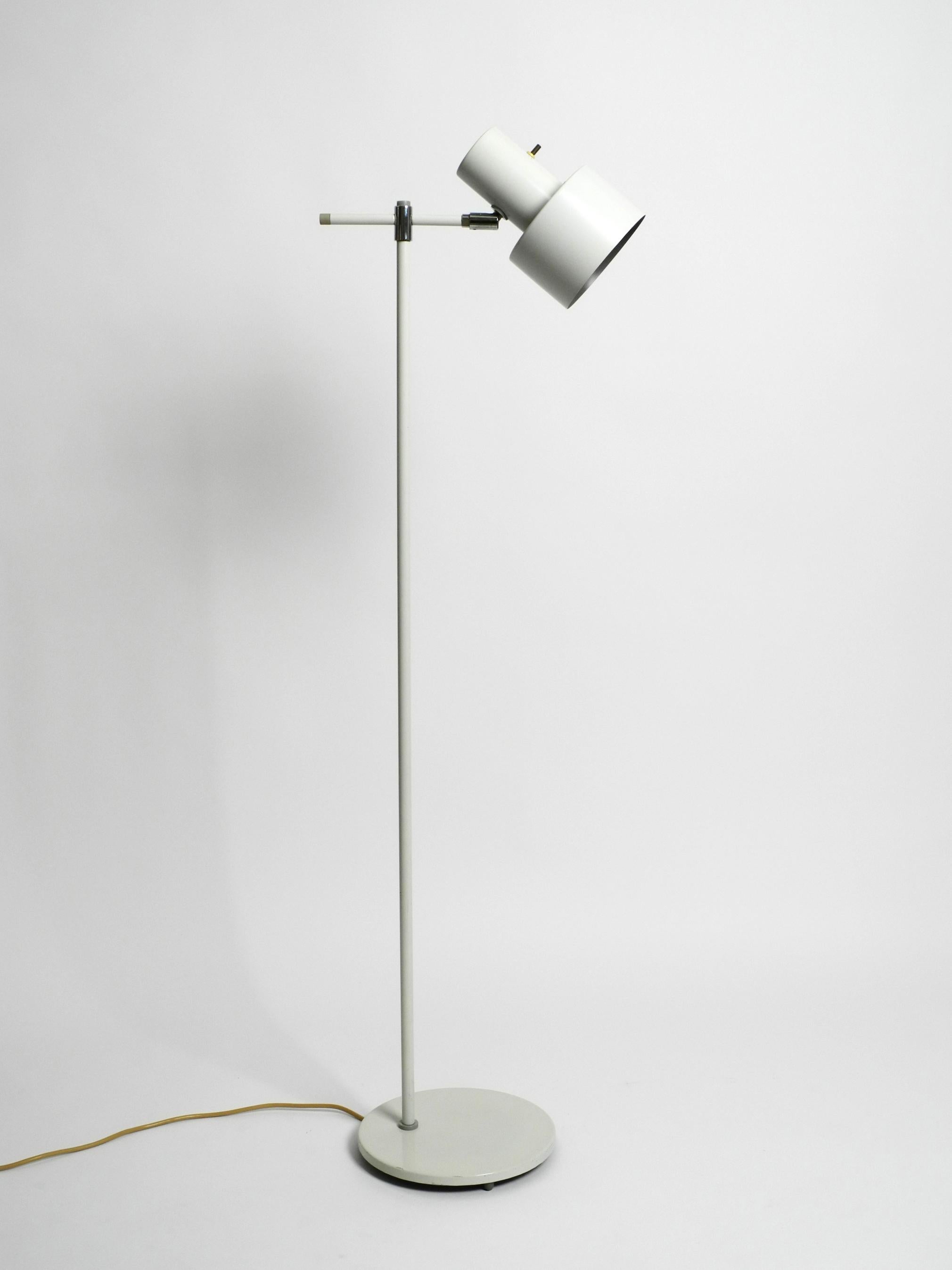 Original 1960s metal floor lamp, model Lento by Fog & Morup. Made in Denmark.
Designed by Jo Hammerborg. The well-known industrial designer from Denmark.
Minimalist Danish design for fantastically beautiful light. Very good vintage condition in