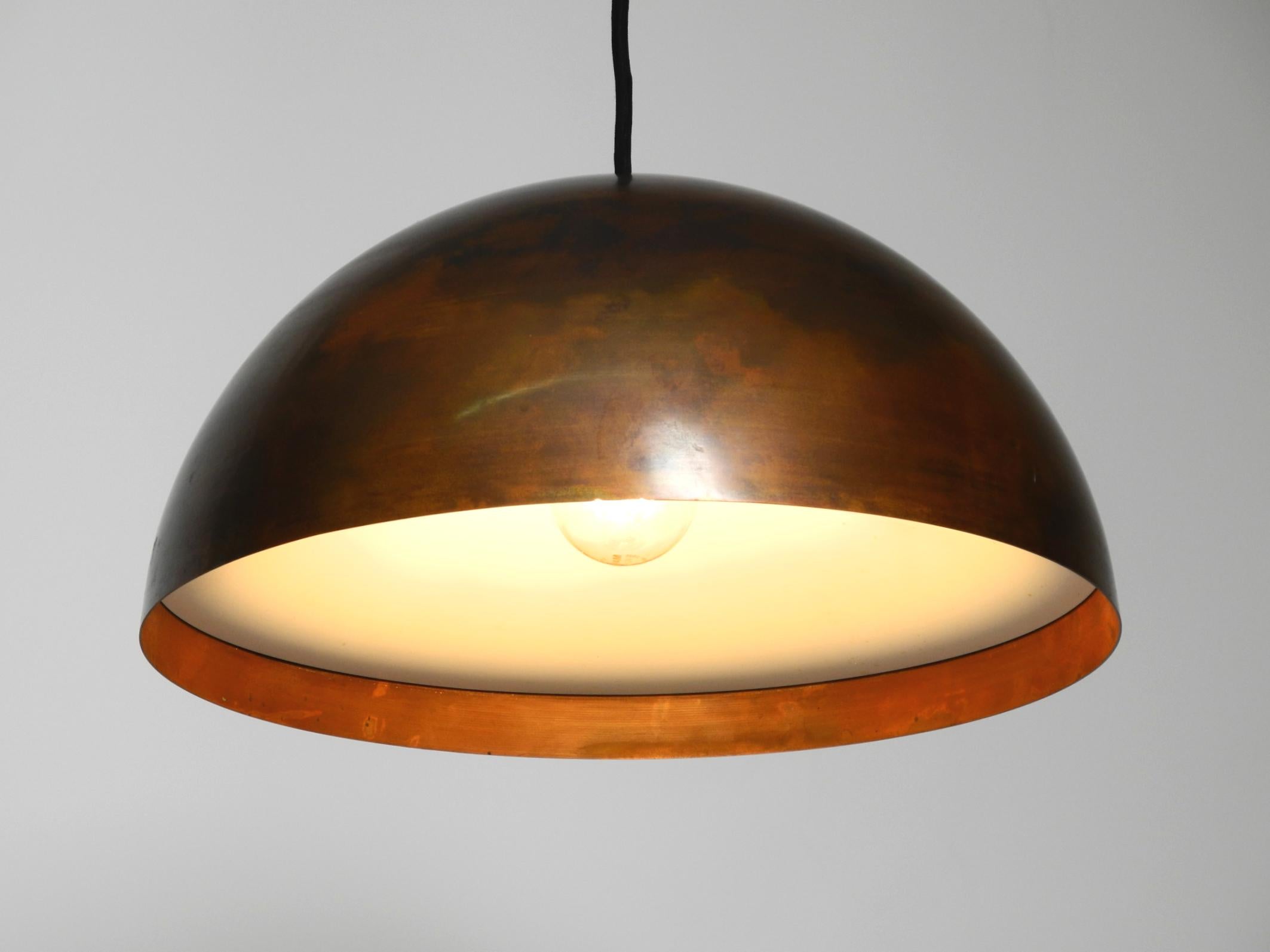 German Original 1960s large Space Age pendant lamp with copper shade in mint condition