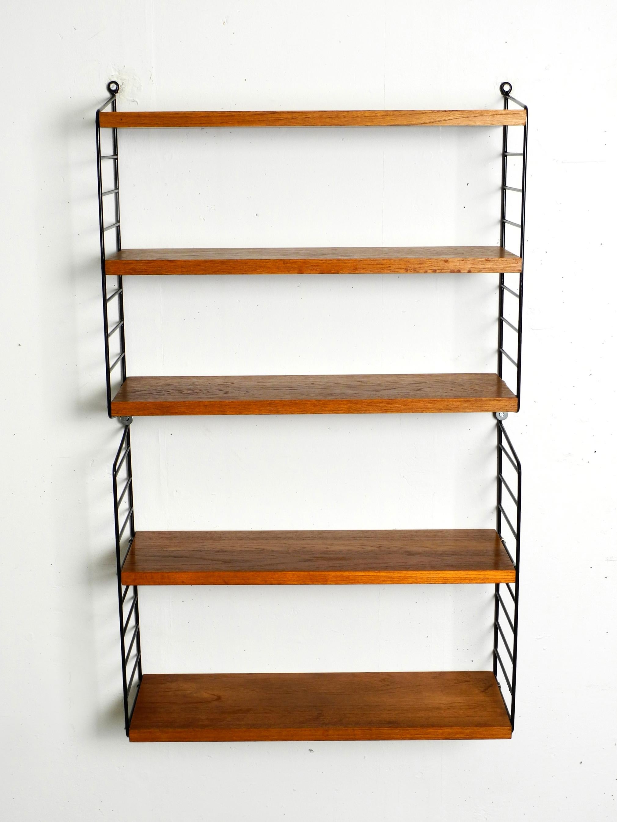 Original 1960's narrow teak Nisse Strinning wall hanging shelf with five shelves 3