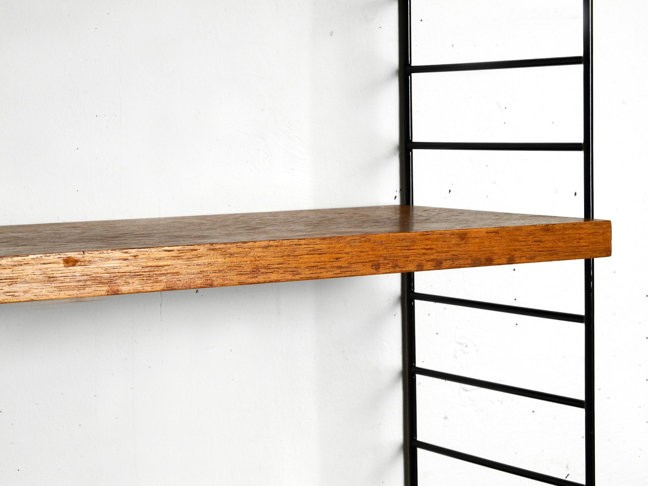 Original 1960's narrow teak Nisse Strinning wall hanging shelf with five shelves 2