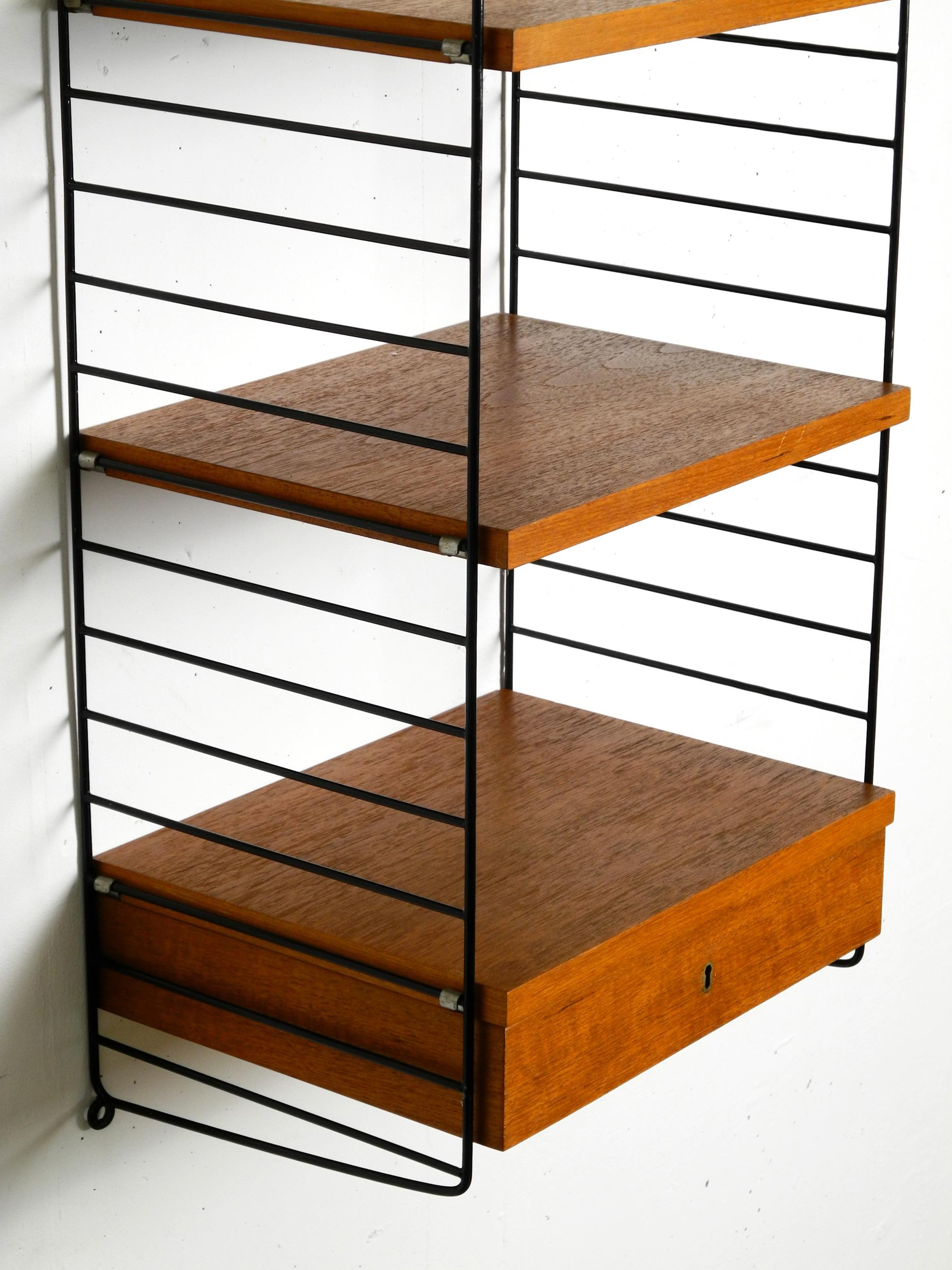 Metal Original 1960s Nisse Strinning teak string shelf with a drawer and 2 shelves