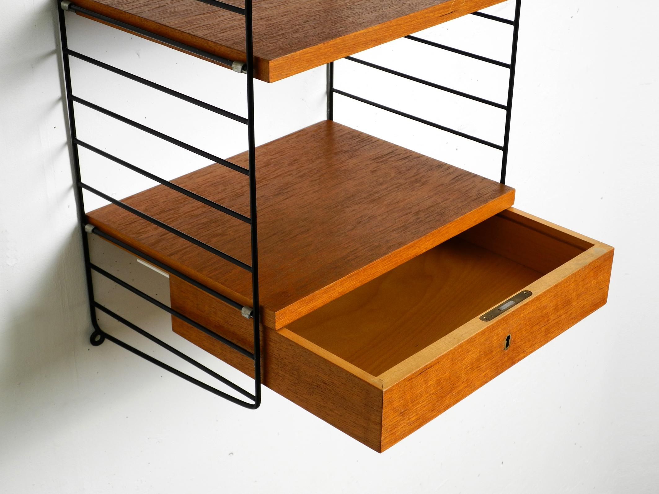 Mid-Century Modern Original 1960s Nisse Strinning teak string shelf with a drawer and 2 shelves