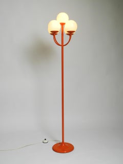 Original 1960s orange floor lamp in Space Age design by Kaiser Leuchten