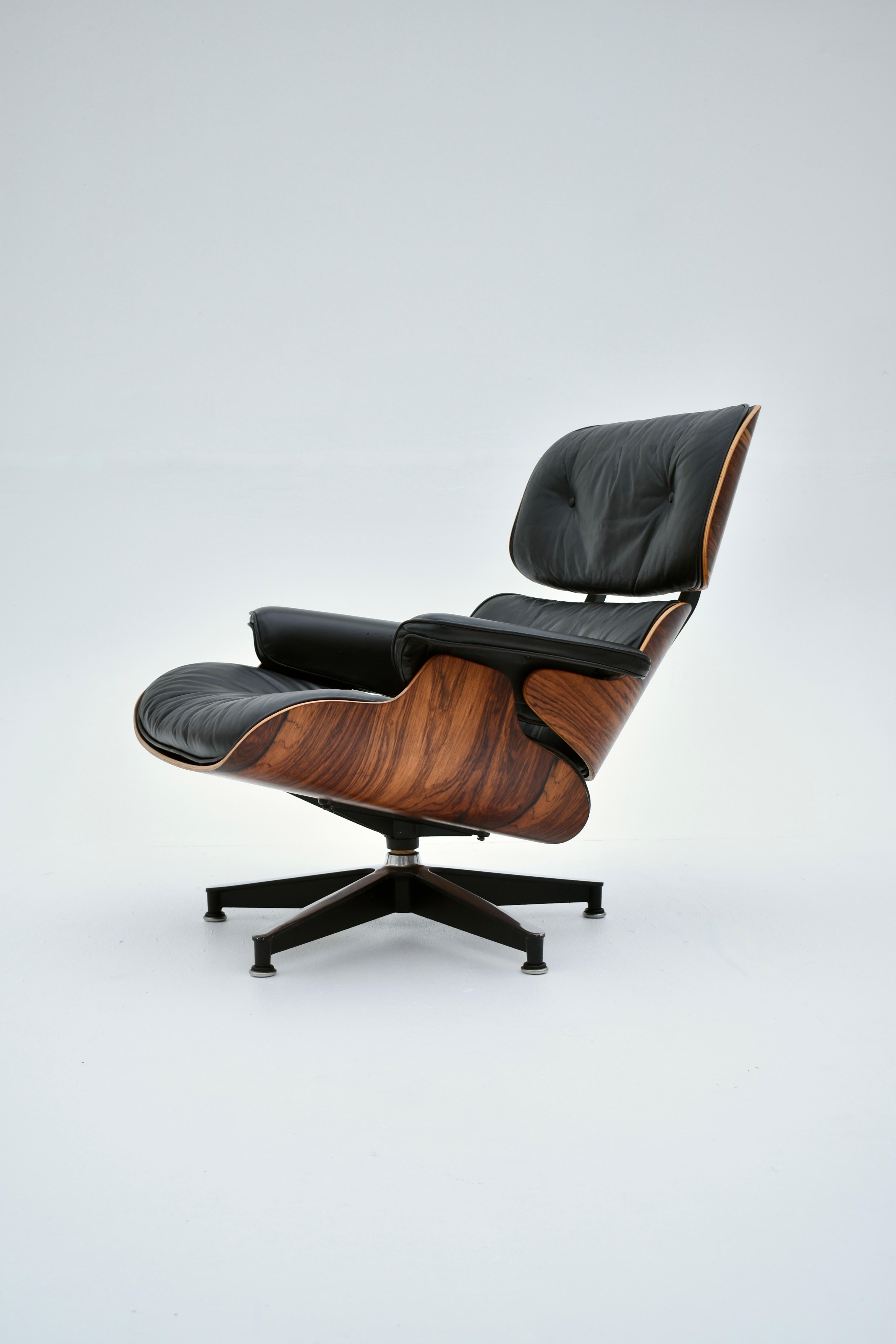 Original Eames Lounge chair produced by Herman Miller. This is what many would describe as a second generation chair as it features cushions filled with a mix of feather down and latex. Later chairs produced after 1971 featured foam cushion.

The