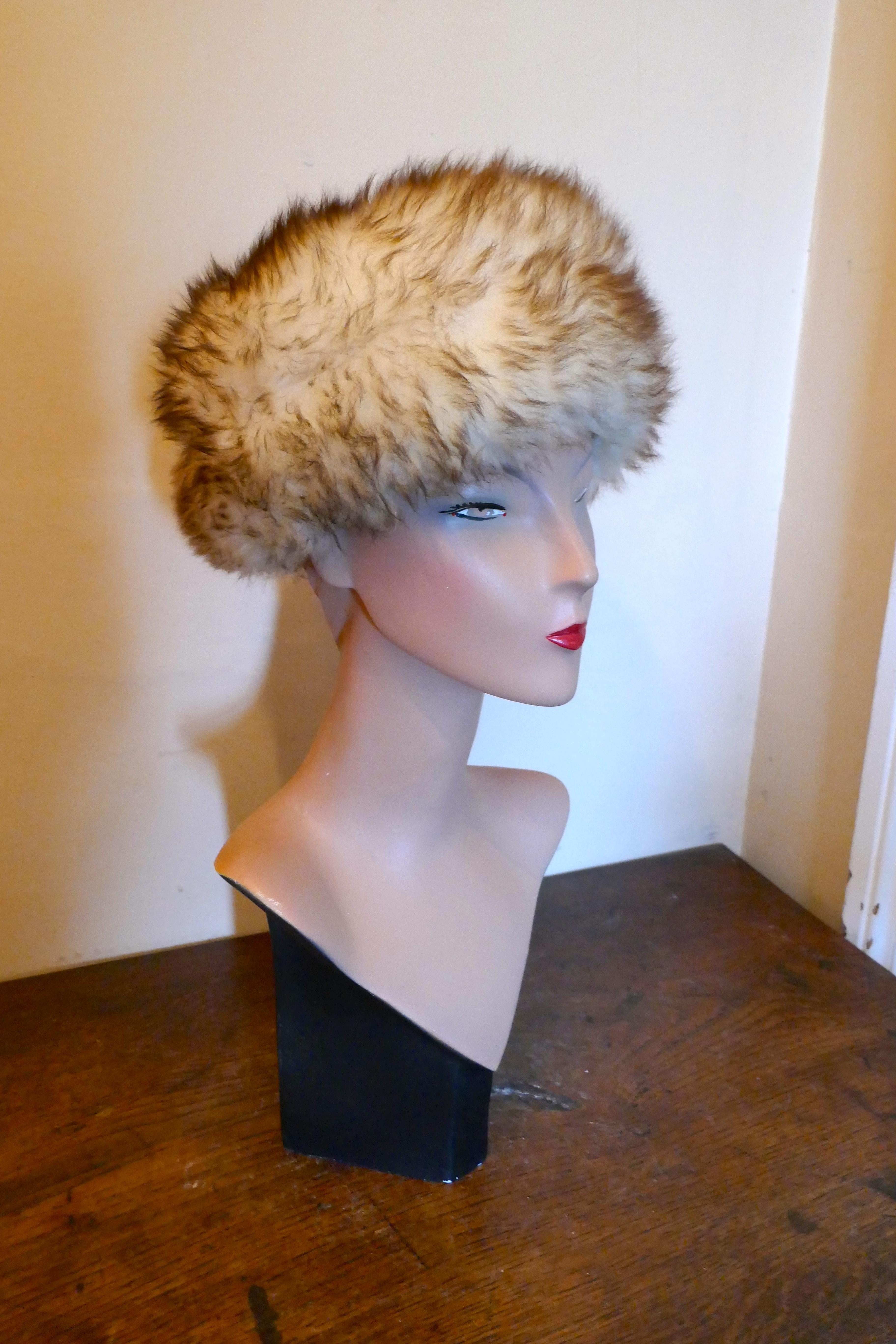 Original 1960s Sheepskin Cossack Style Winter Hat 

This gorgeous Hat is very light but warm and fashionable, it has beautiful deep furry pile with a dark highlight overlay 
This one is an exquisite design wear it anywhere and keep warm
The hat is