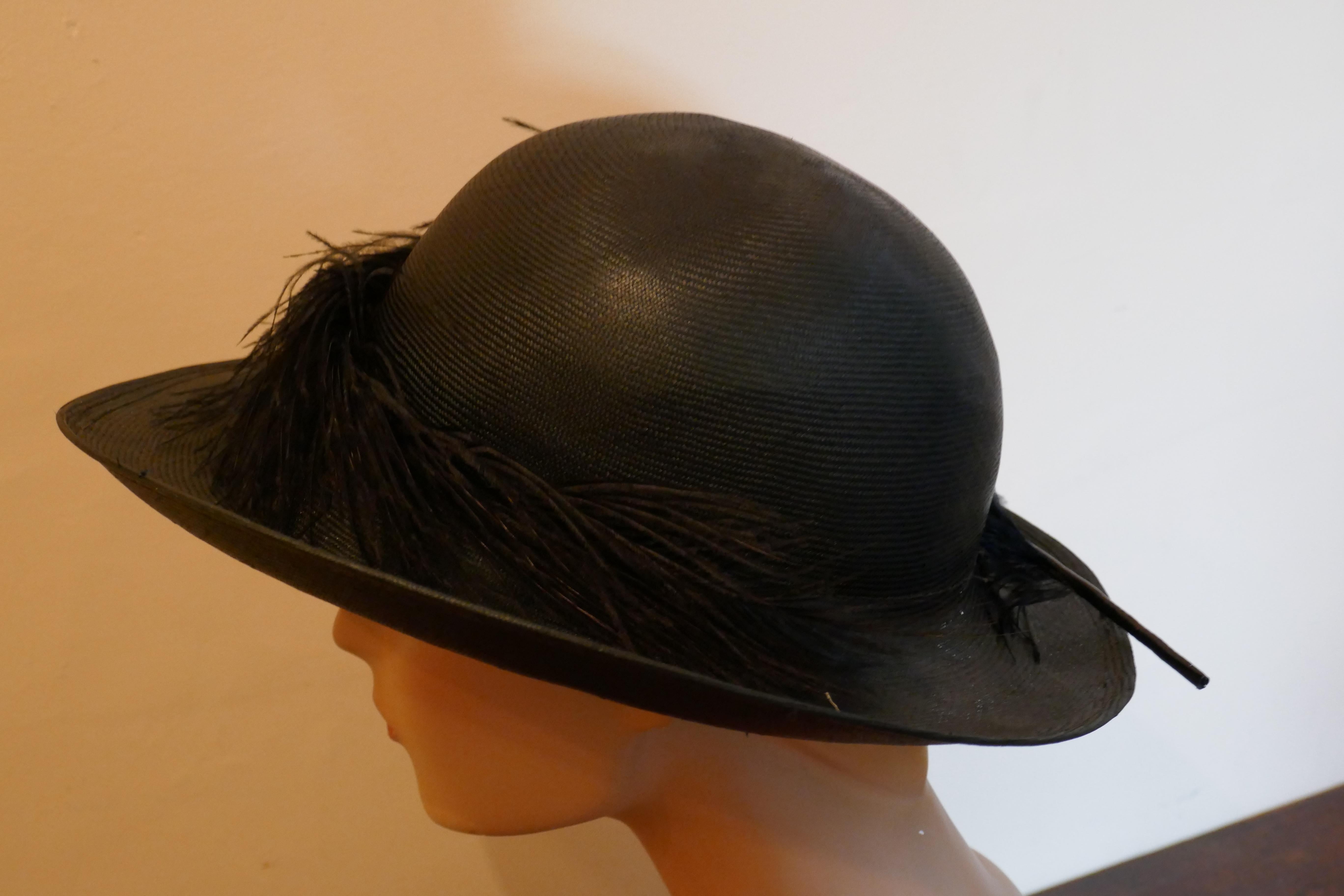Original 1960s Shiny Black Panama Hat trimmed with Ostrich Feather For Sale 1