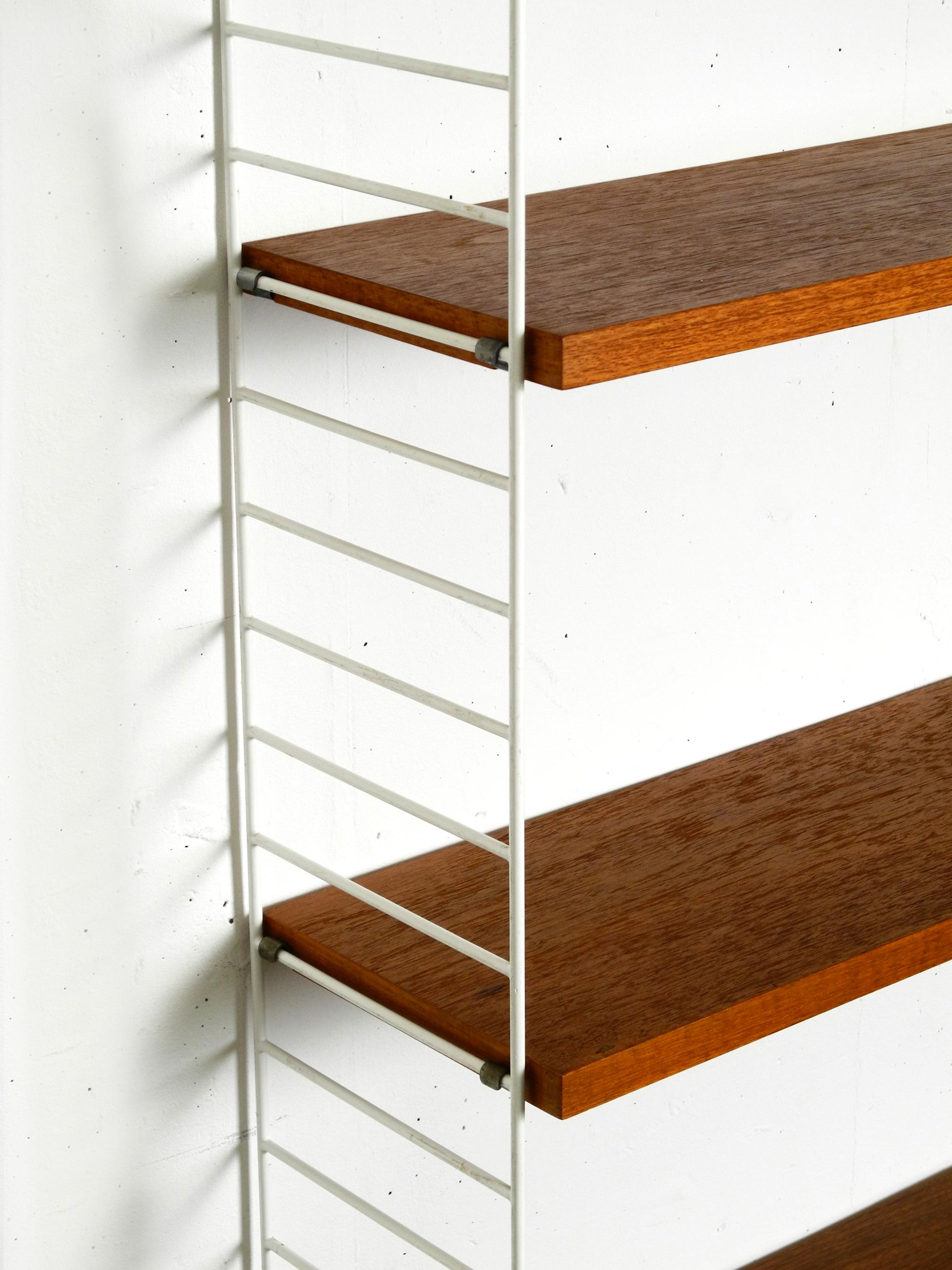 Original 1960s teak Nisse Strinning wall hanging shelf with 4 shelves 5