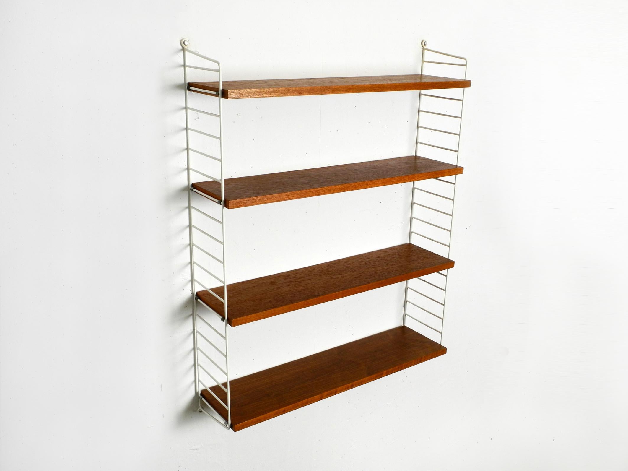 Mid-Century Modern Original 1960s teak Nisse Strinning wall hanging shelf with 4 shelves