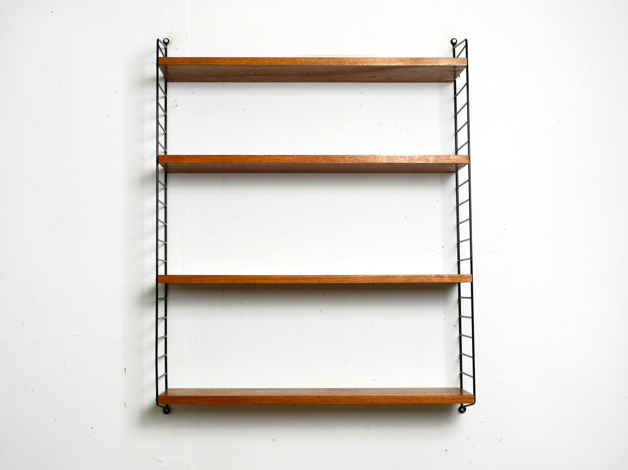 Danish Original 1960s Teak Nisse Strinning Wall Hanging Shelf with 4 Shelves